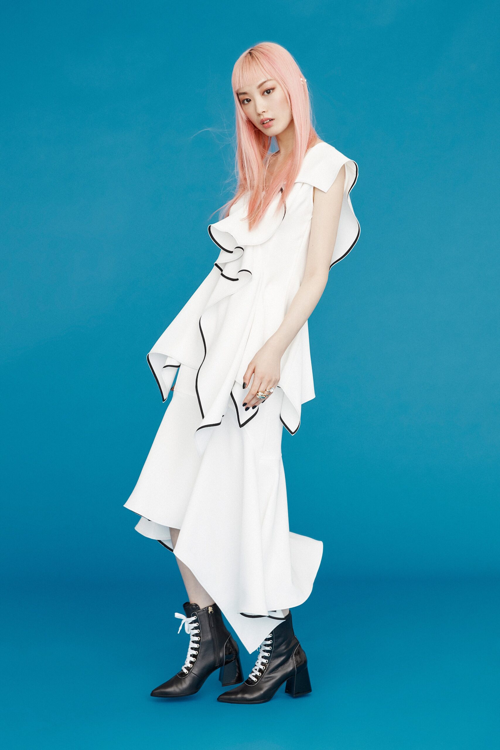 white ruffled midi dress with black boots