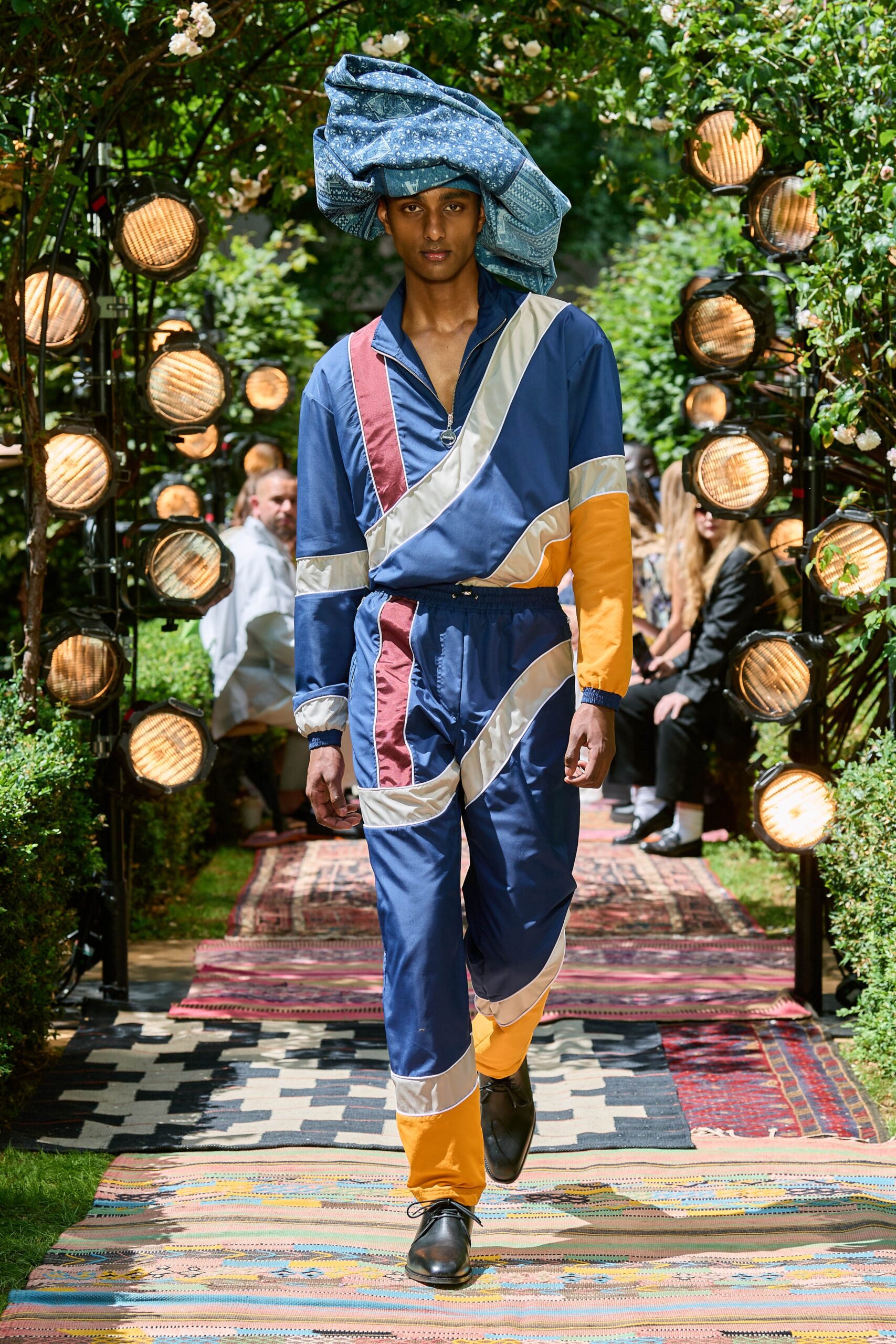 color-blocked blue jumpsuit with hat