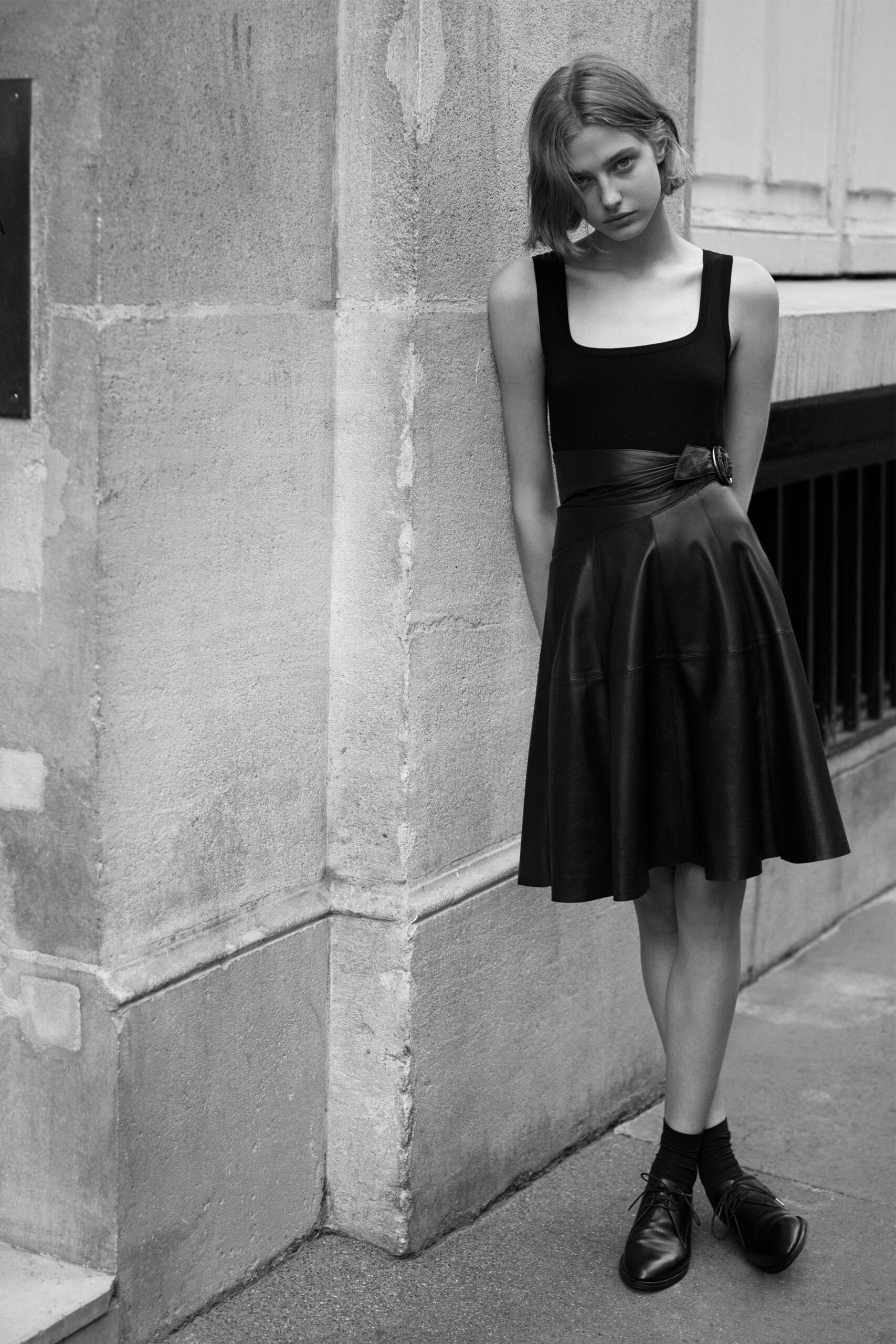 black leather sleeveless mini dress