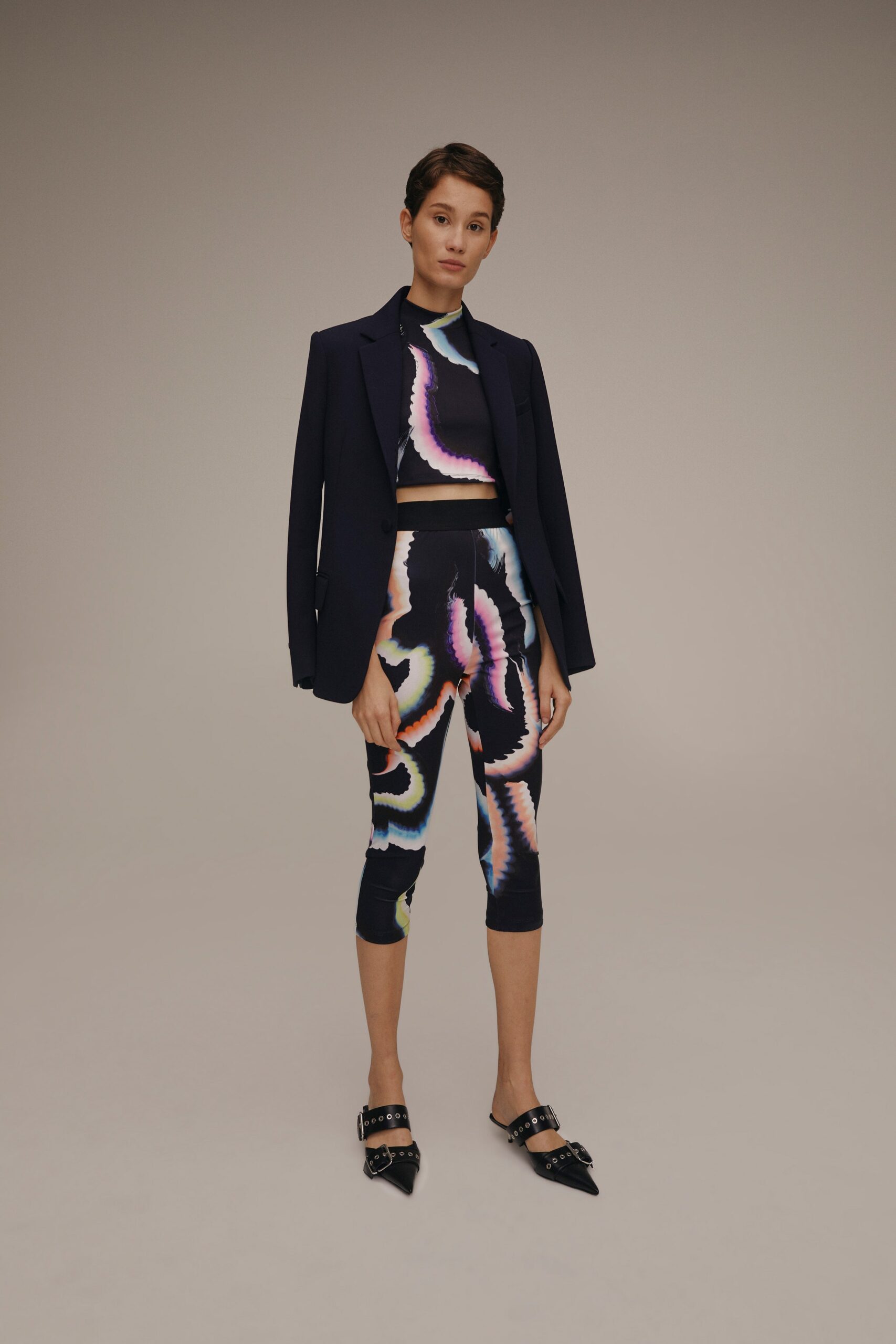 black blazer with multi print top and leggings