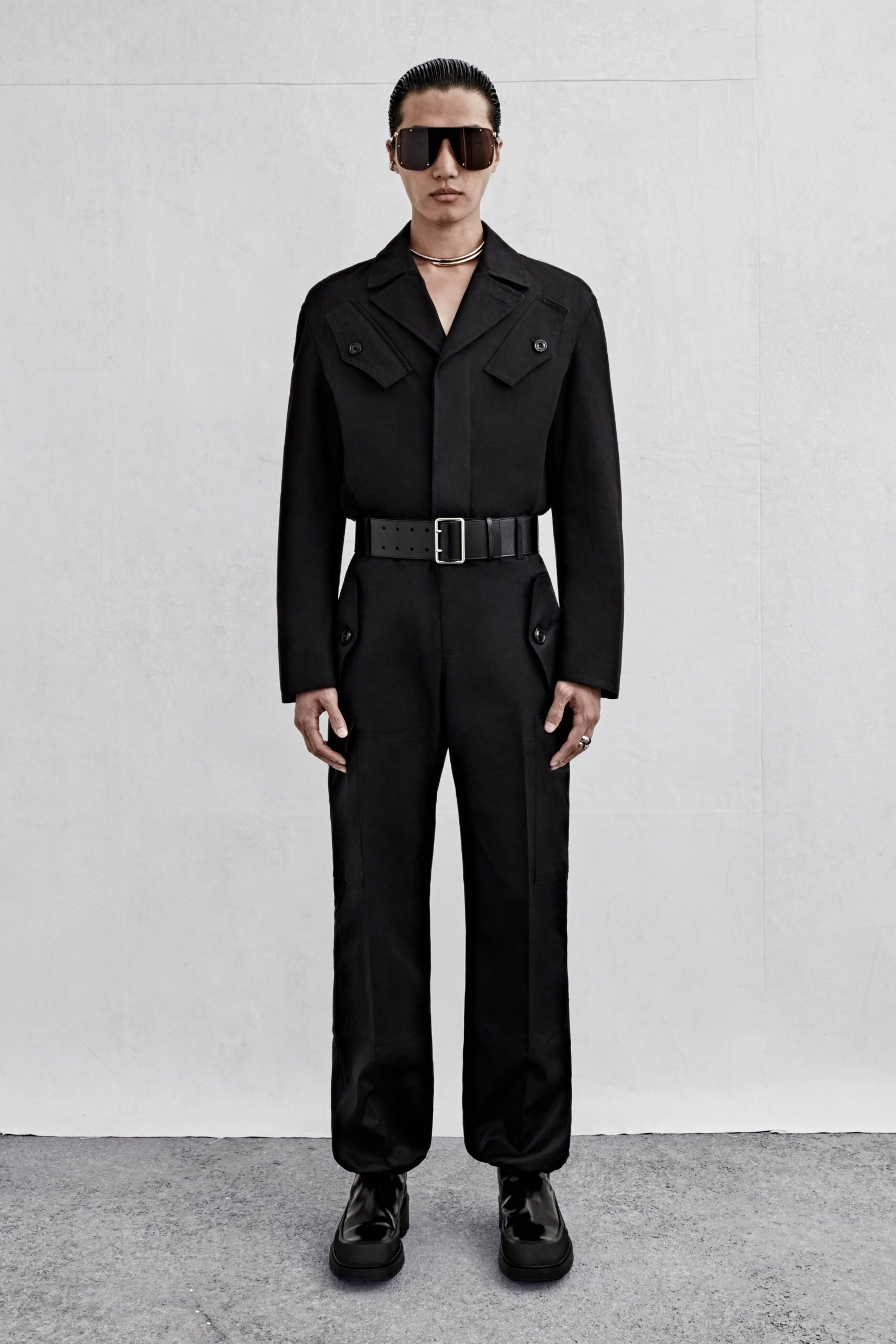 black fitted jumpsuit with accessories
