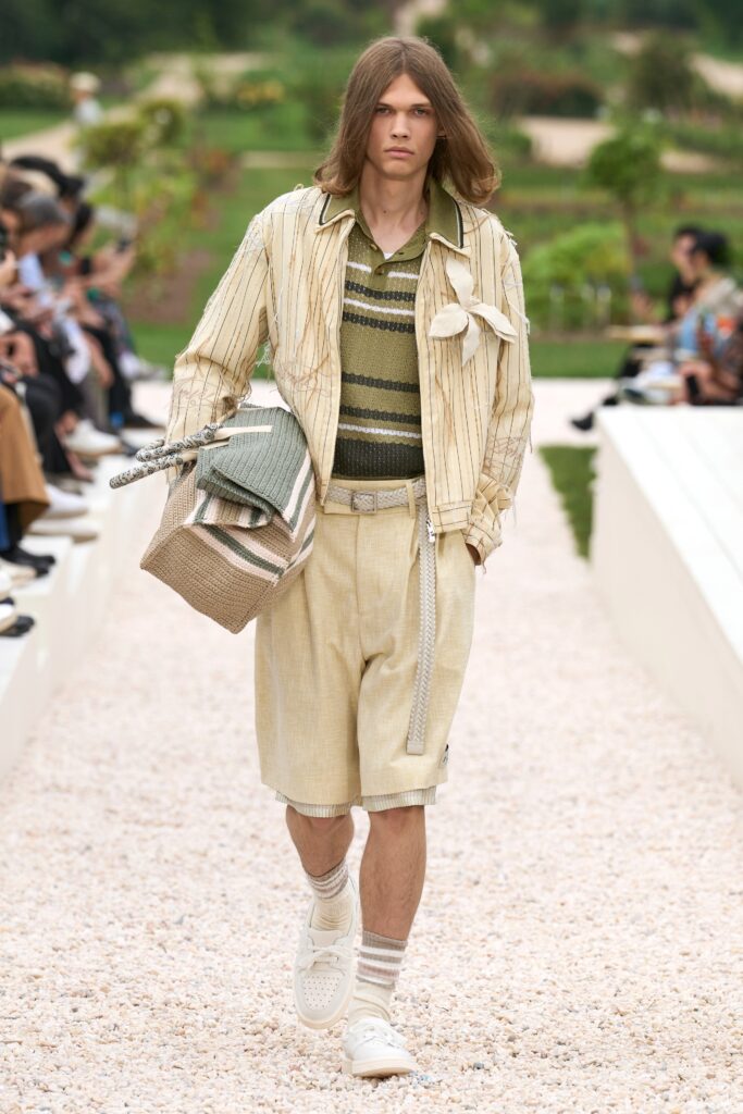 A relaxed beige striped shirt paired with matching shorts, perfect for a casual summer look.