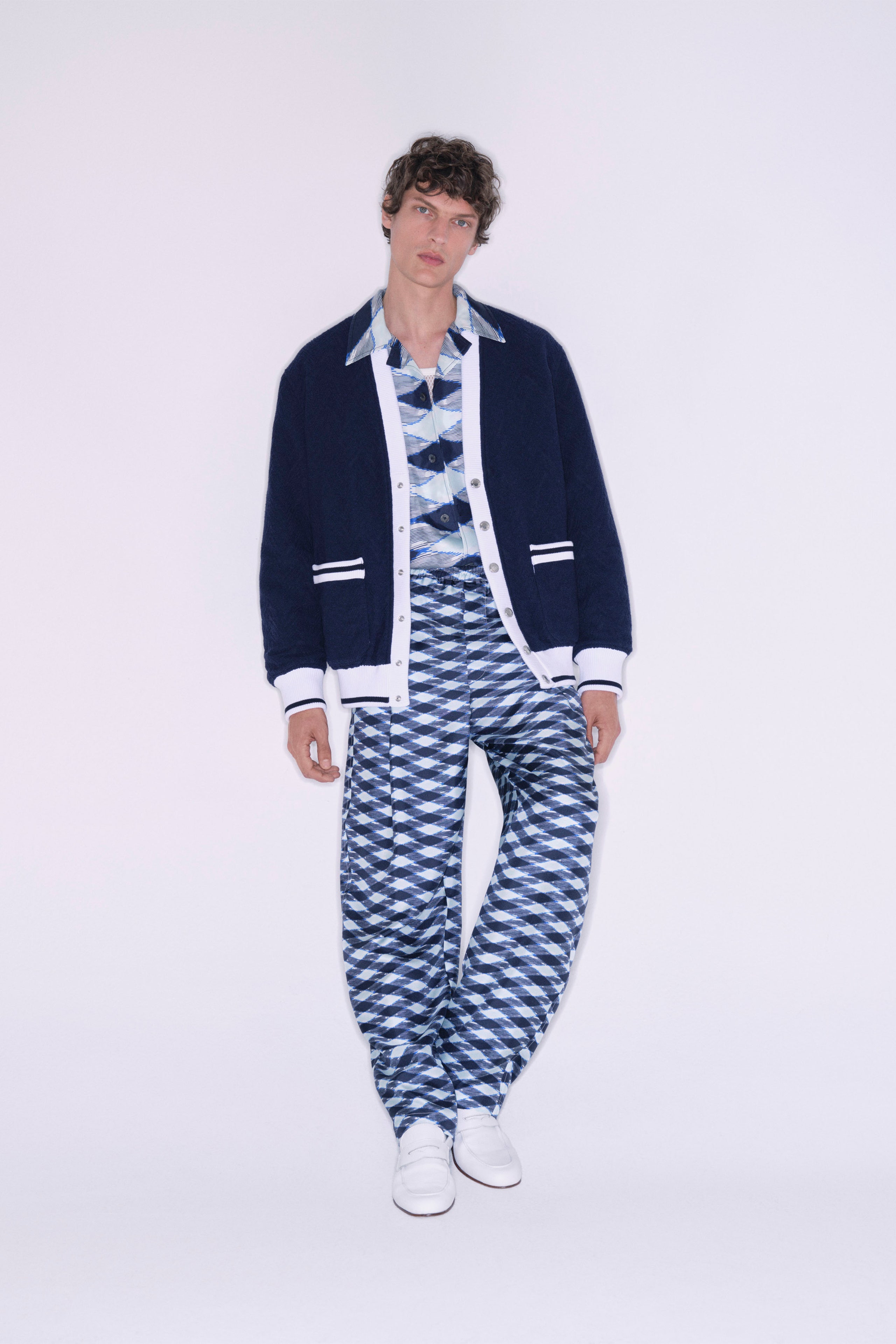 A relaxed fit blue printed jacket with long sleeves and matching pants.