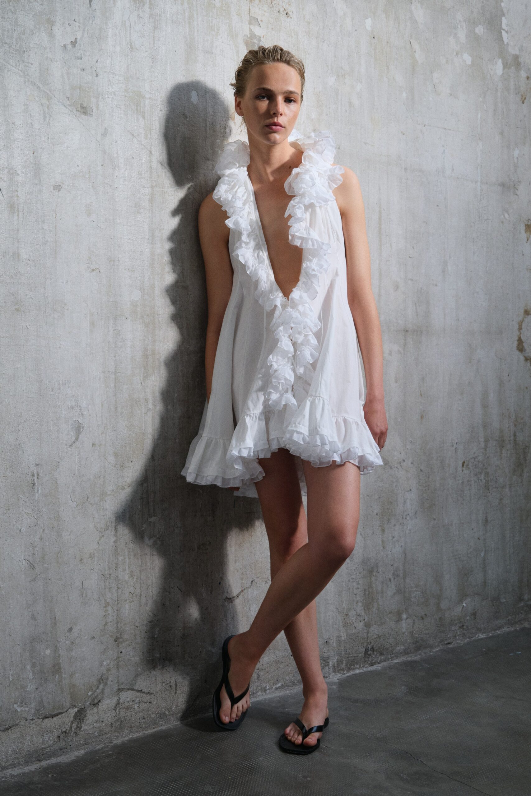 white ruffled mini dress