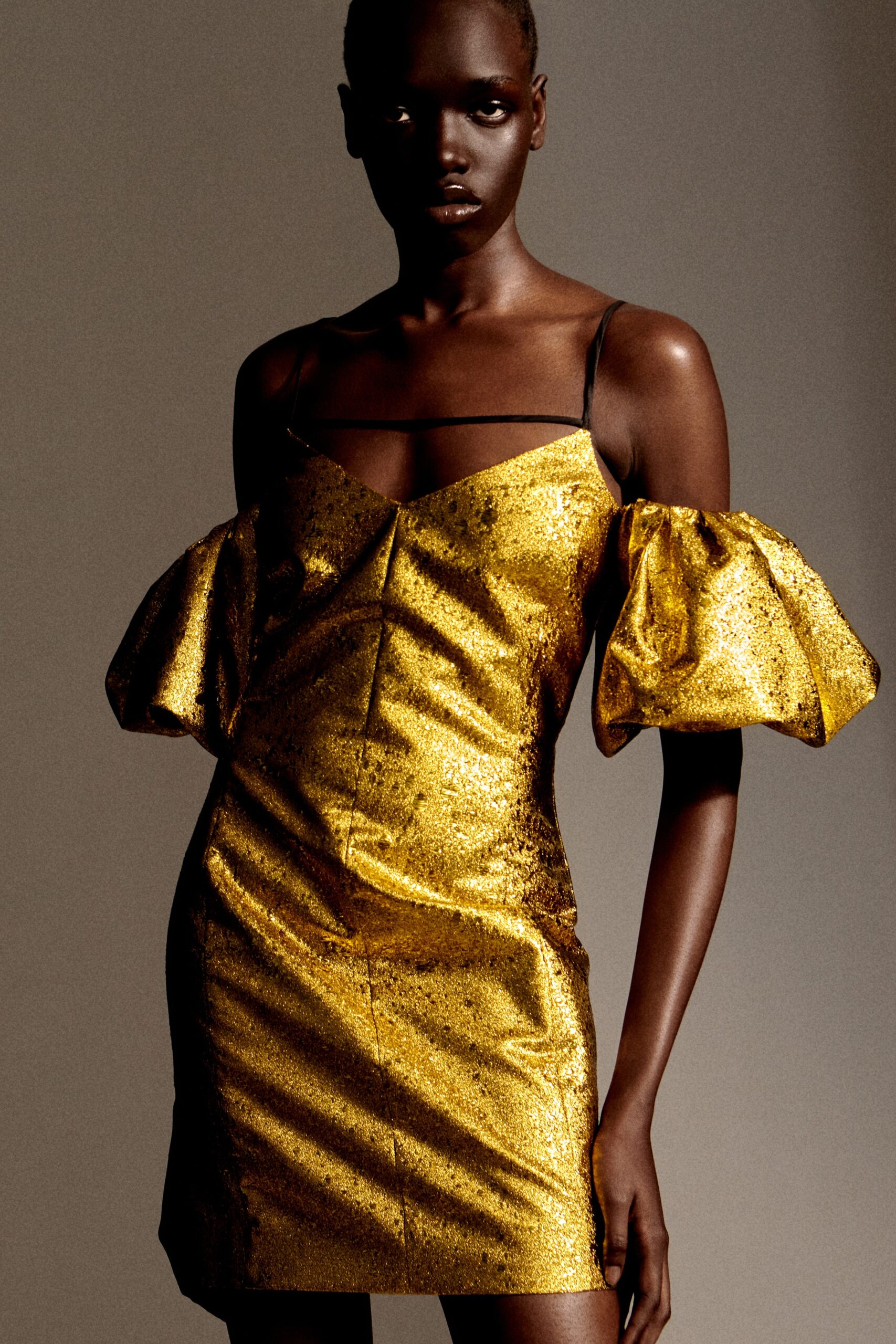 gold fitted sleeveless dress