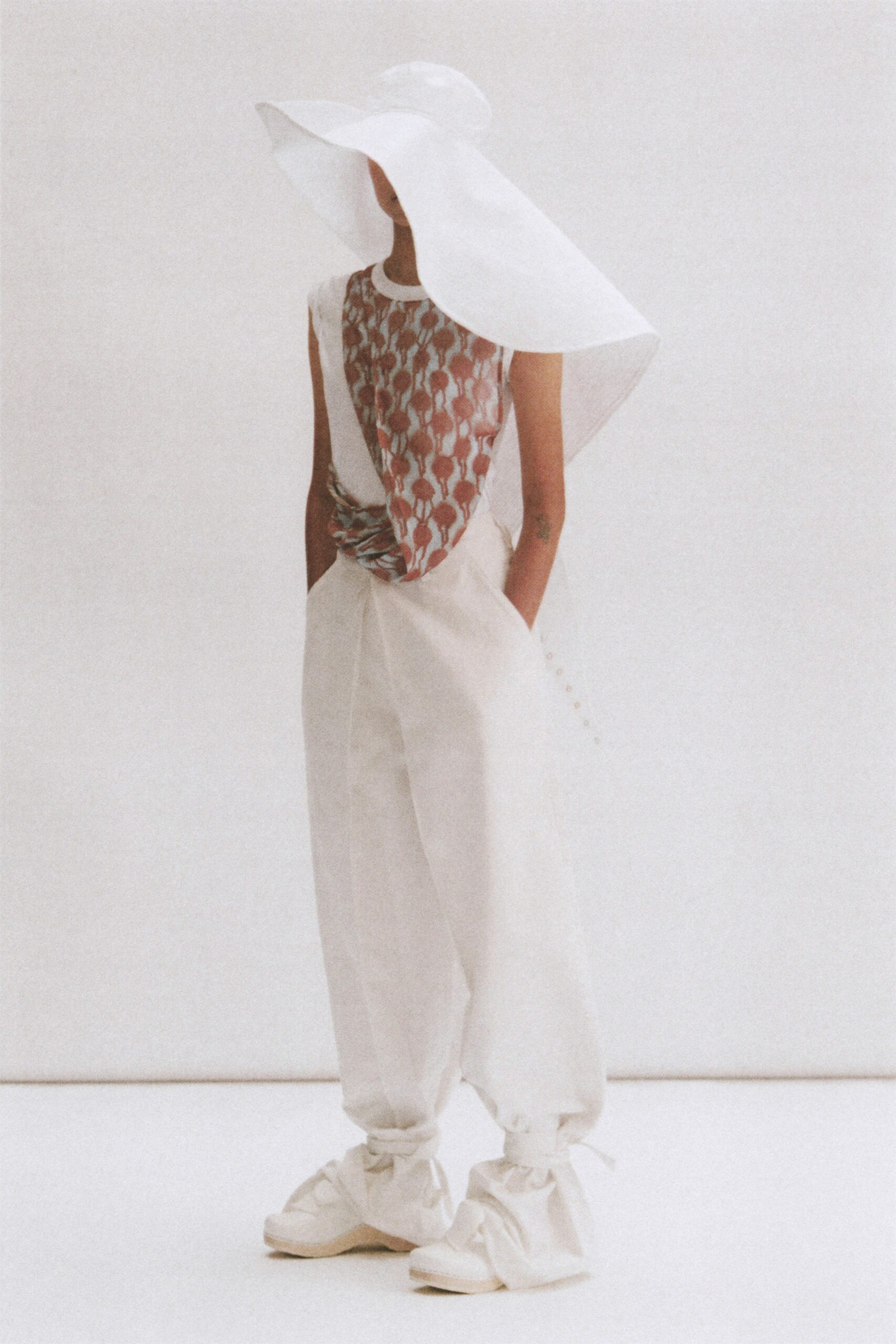 white relaxed top and pants