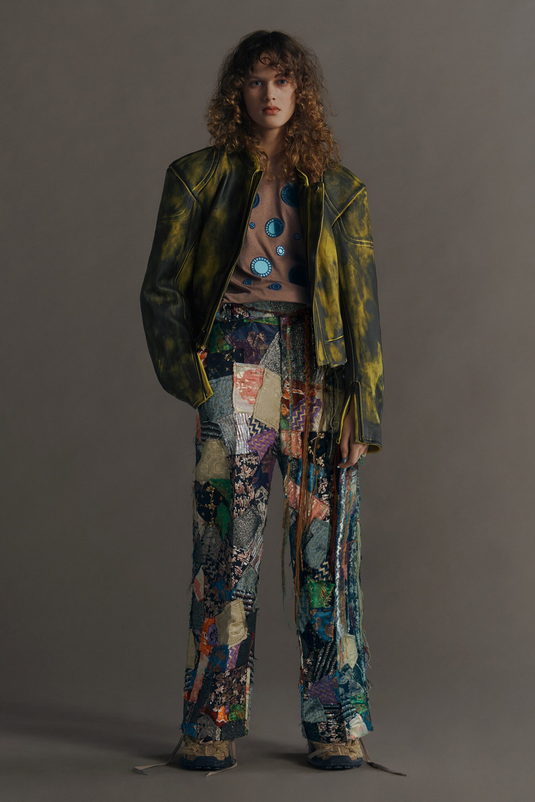 fitted leather jacket with patchwork pants