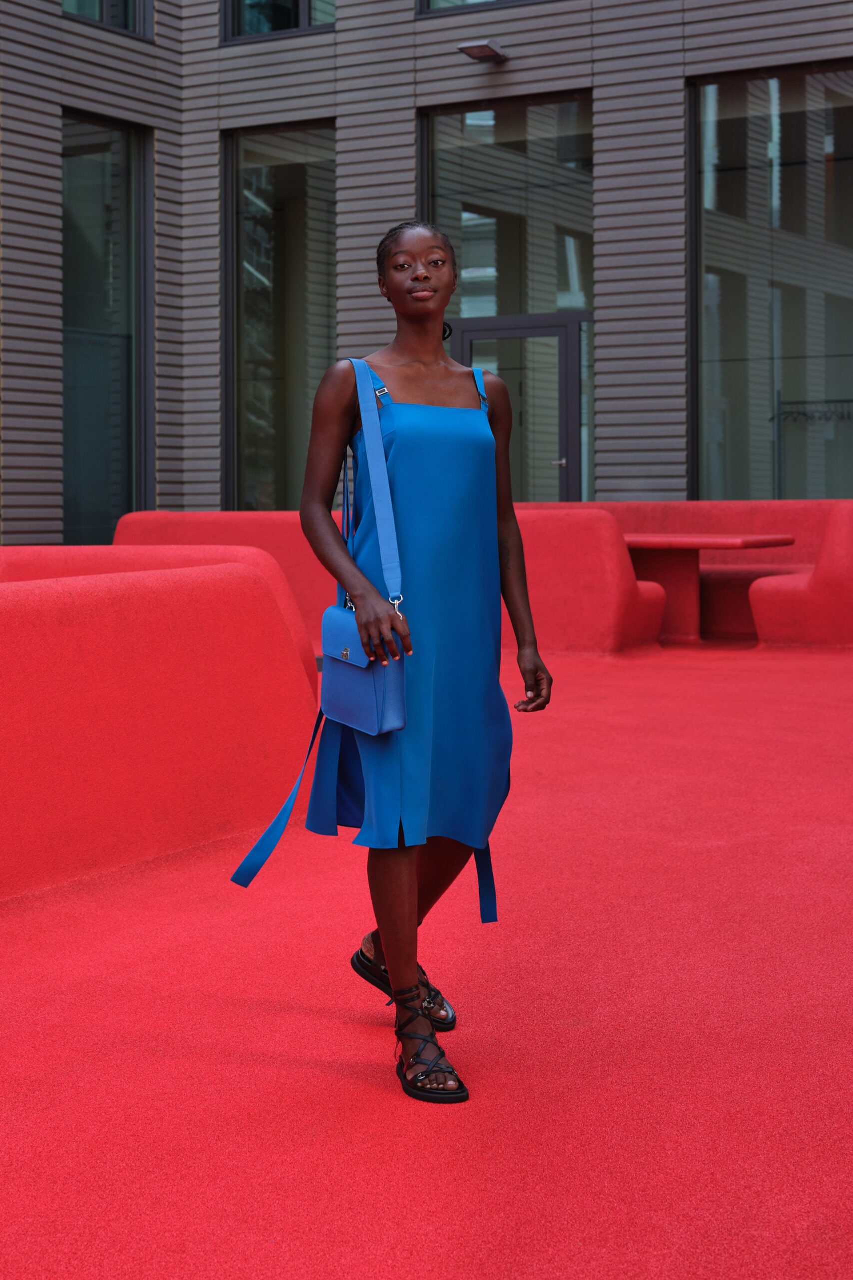 blue midi dress with strappy shoes