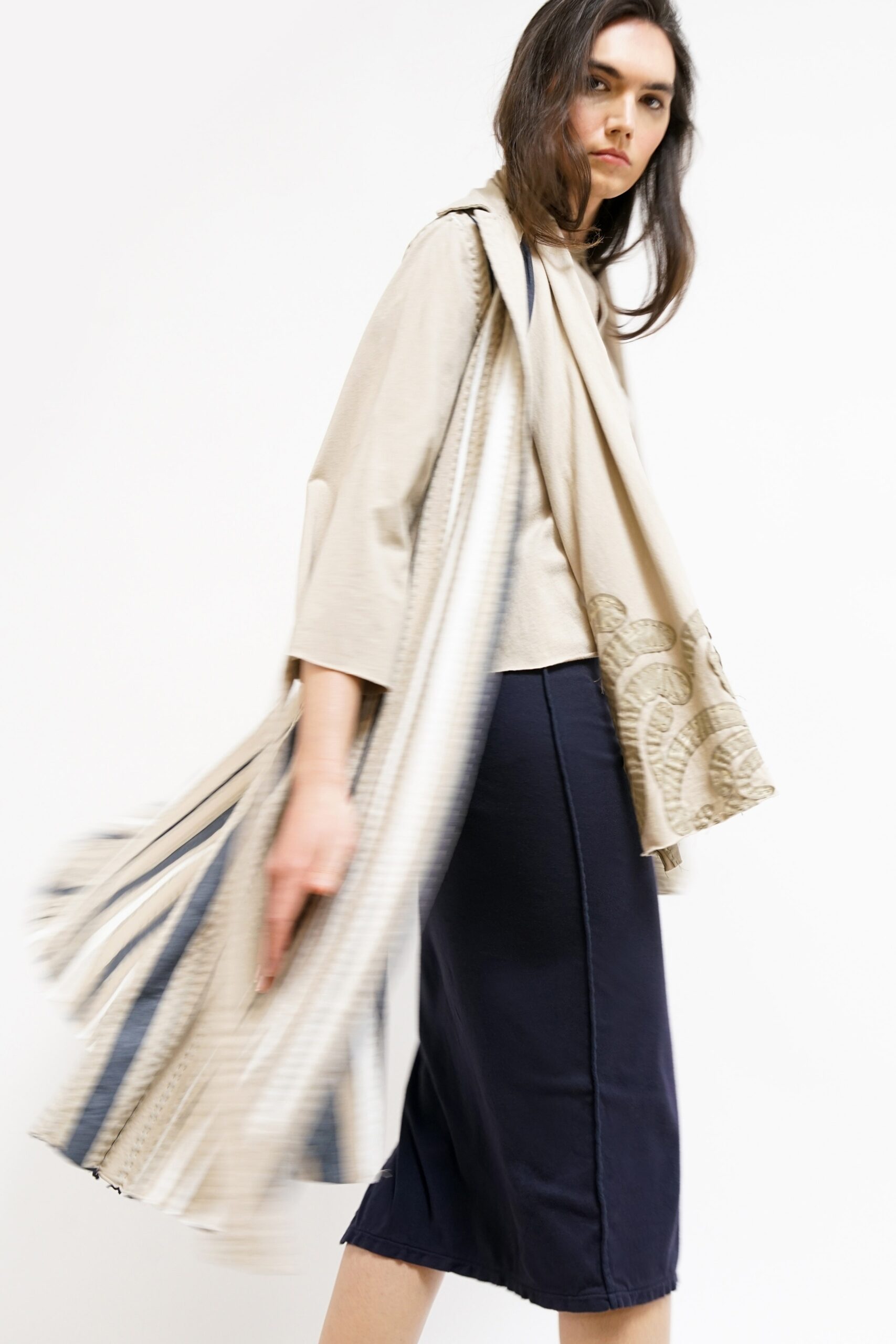 beige cotton top with navy midi skirt