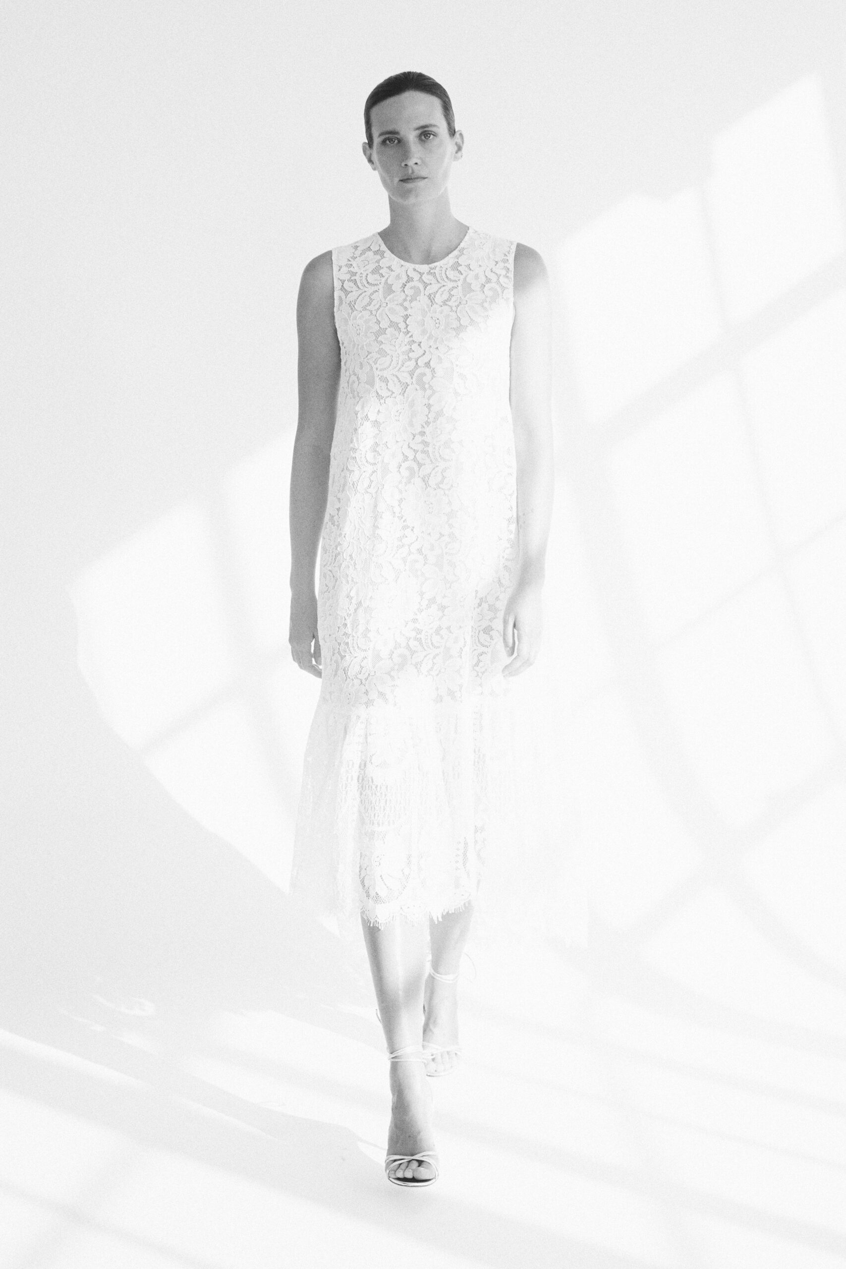 white lace sleeveless dress