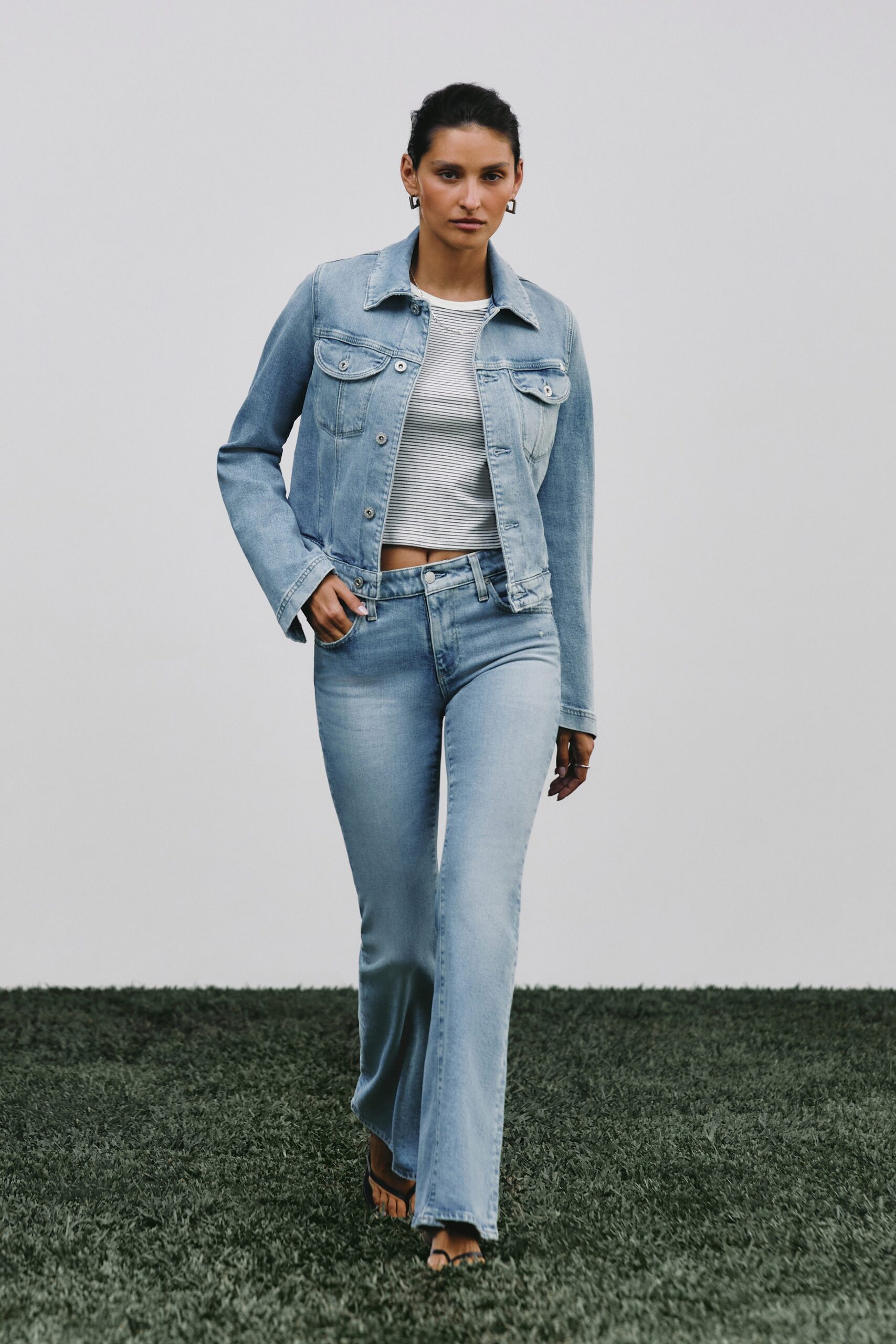 blue denim jacket with gray top