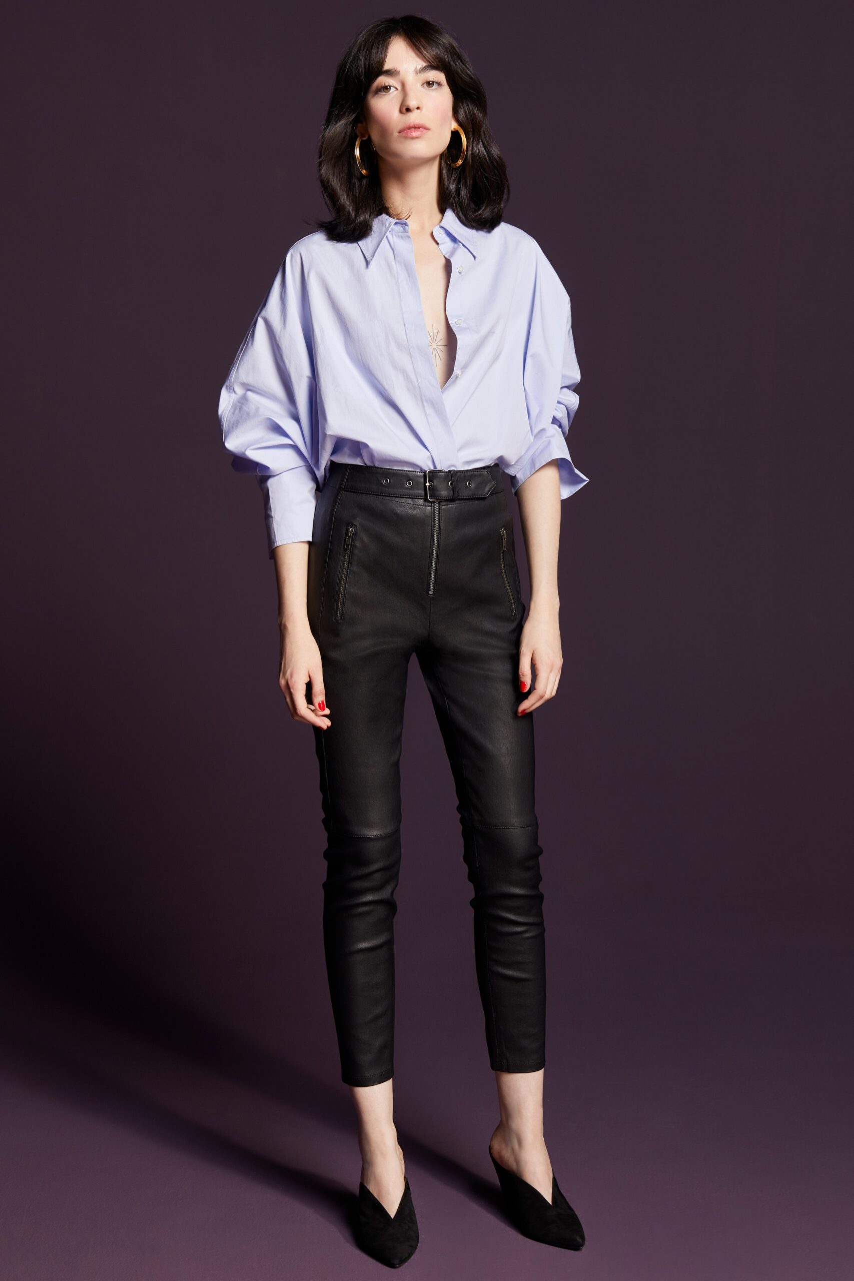 blue cotton shirt with black leather pants