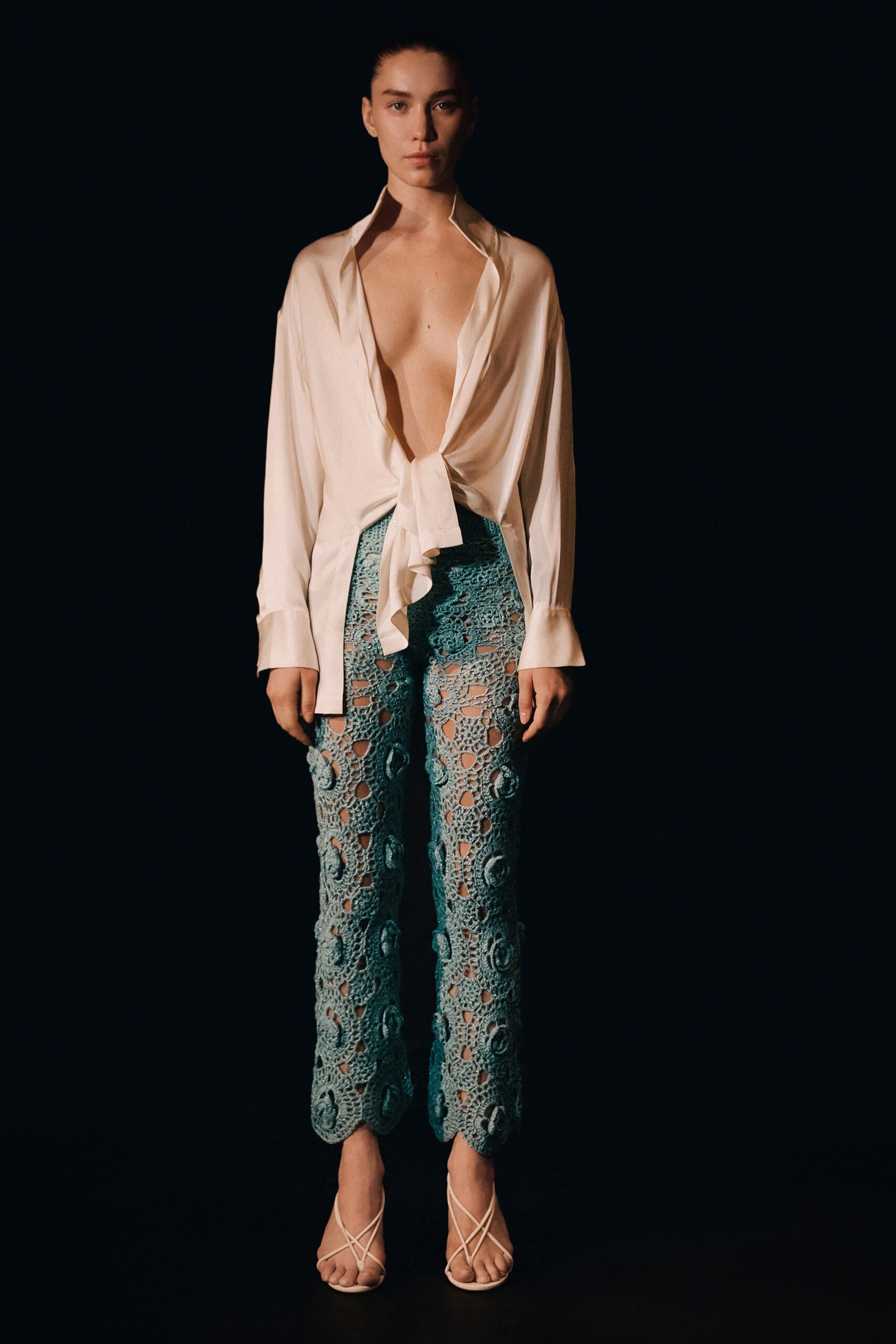 white silk shirt blue crochet pants