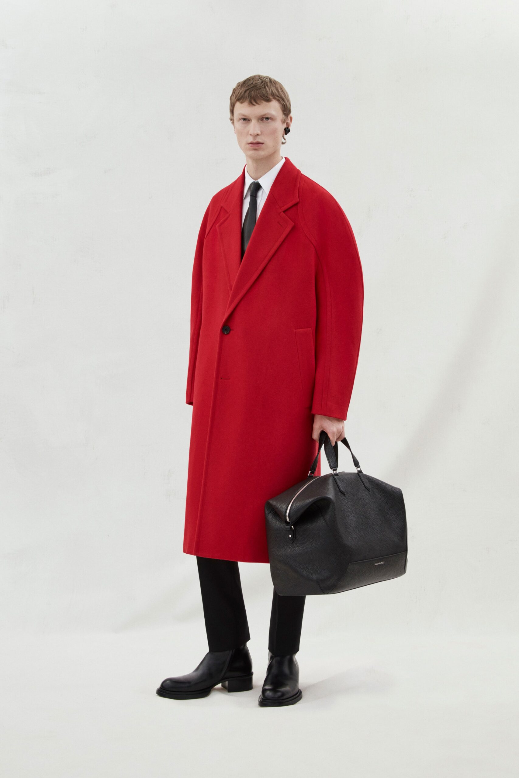 red wool long-sleeve collared oversized buttoned coat