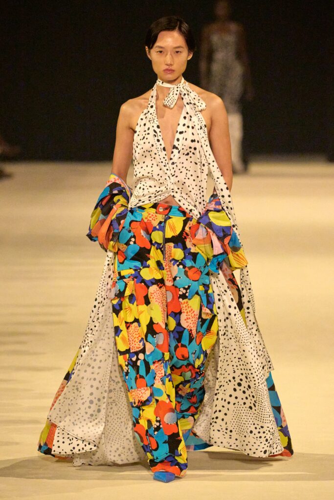 A relaxed multicolor sleeveless dress with a V-neckline and layered design.
