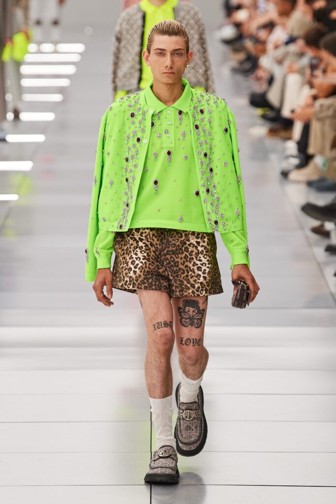 A relaxed neon green short-sleeve shirt paired with printed leopard shorts.