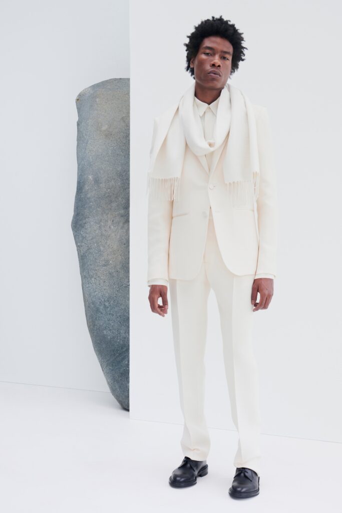 white tailored suit with scarf