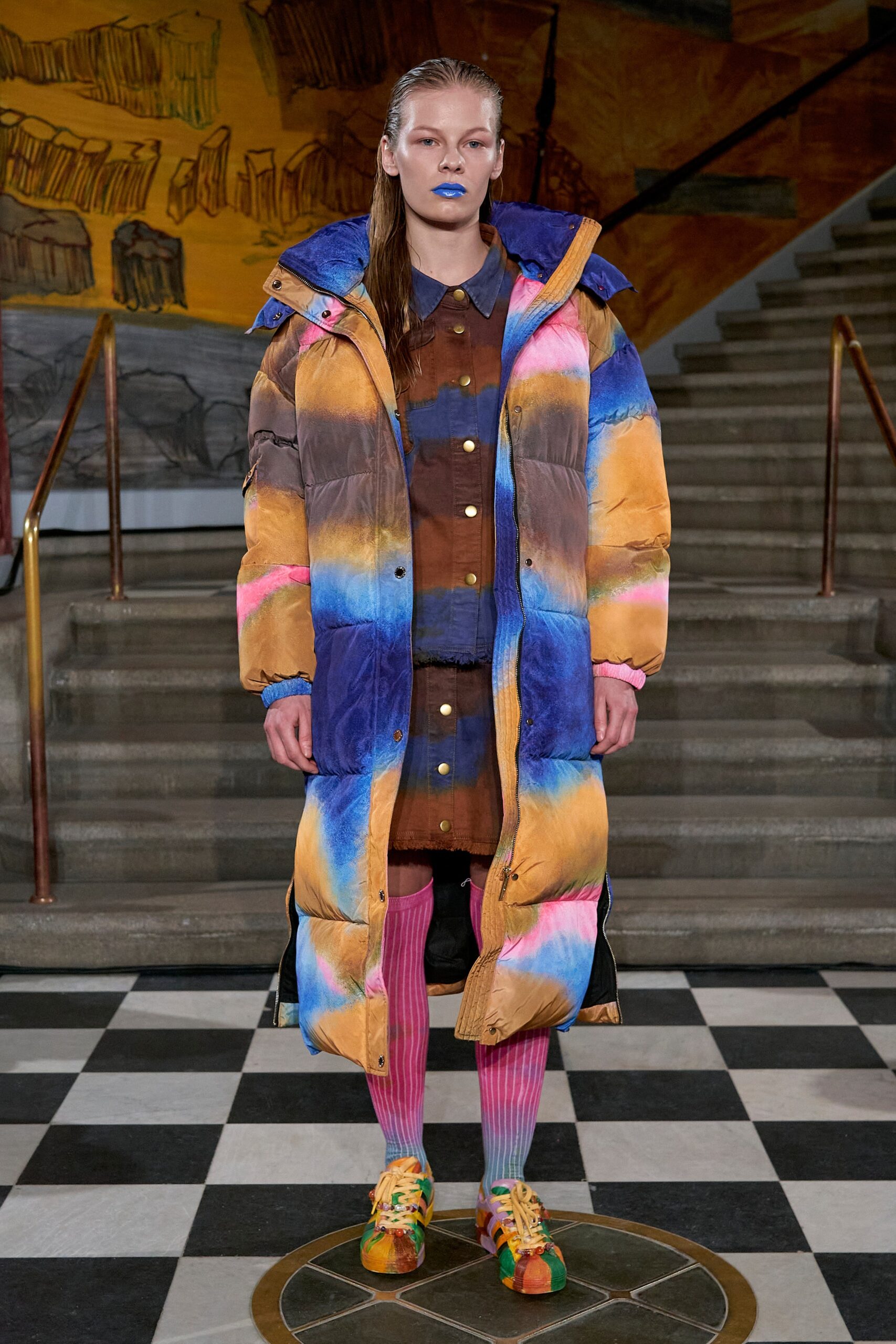 A relaxed multicolor coat dress with long sleeves and a buttoned front, featuring a color-blocked design.