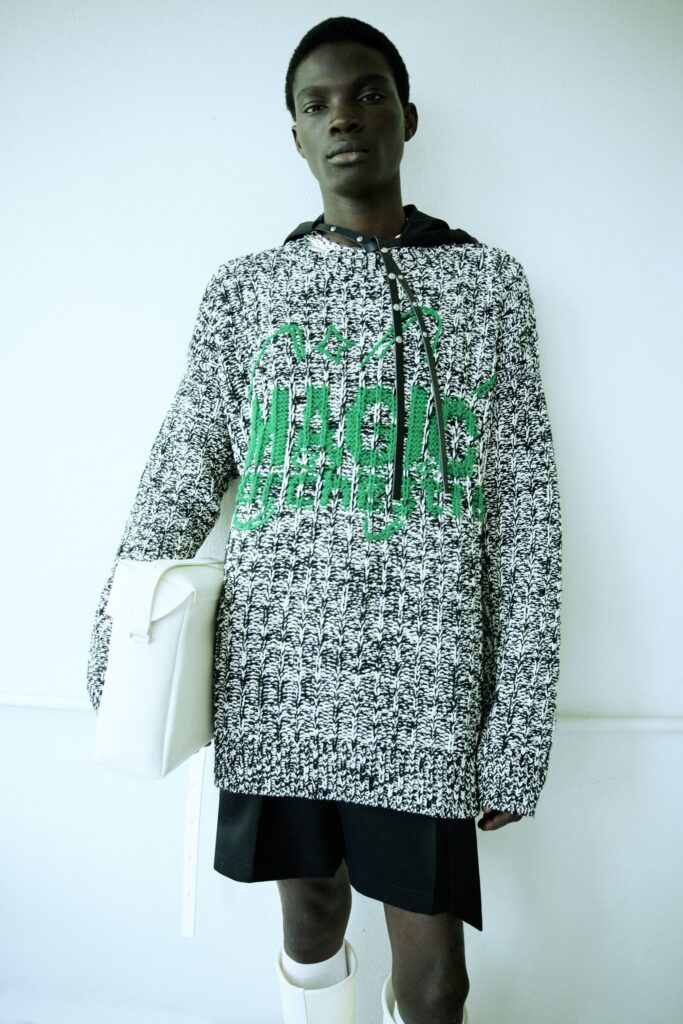 oversized black and white hoodie with green print