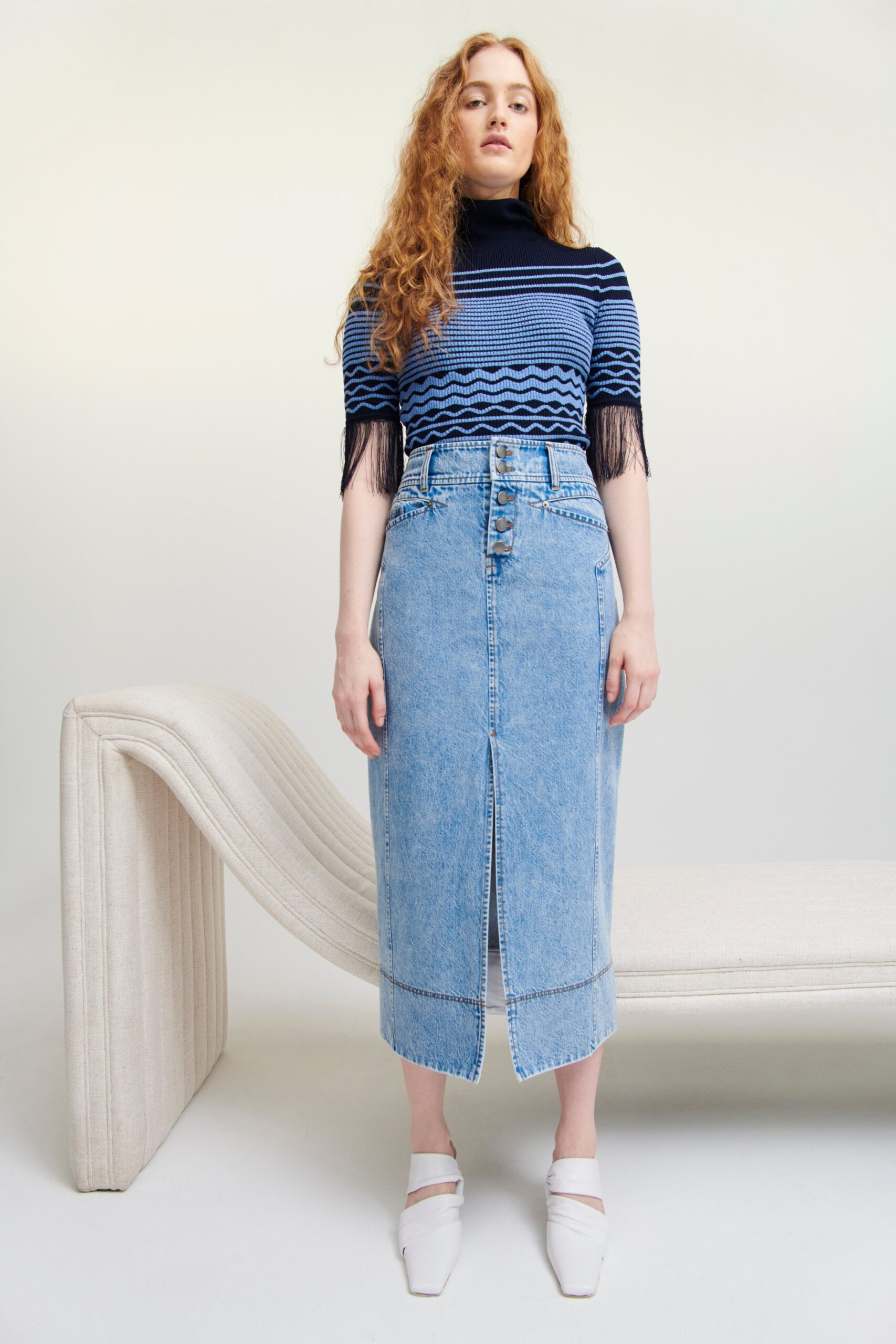 blue fitted top and denim skirt