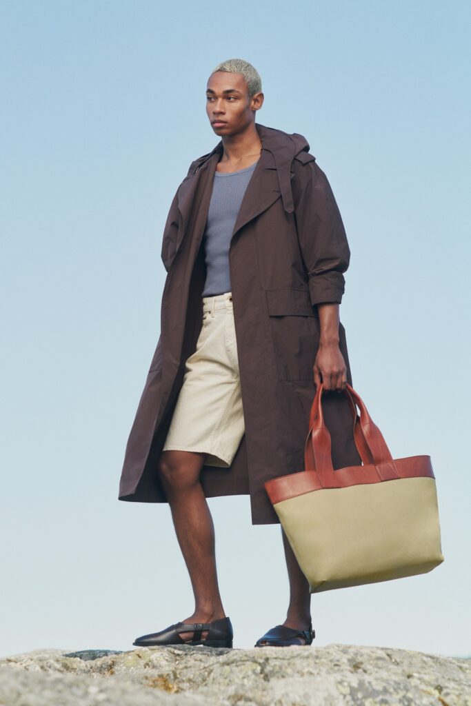 brown coat blue top beige shorts