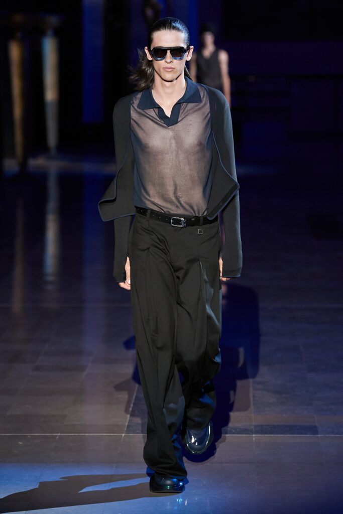 black sheer shirt and wide-leg pants