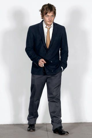 blue tailored blazer with gray pants