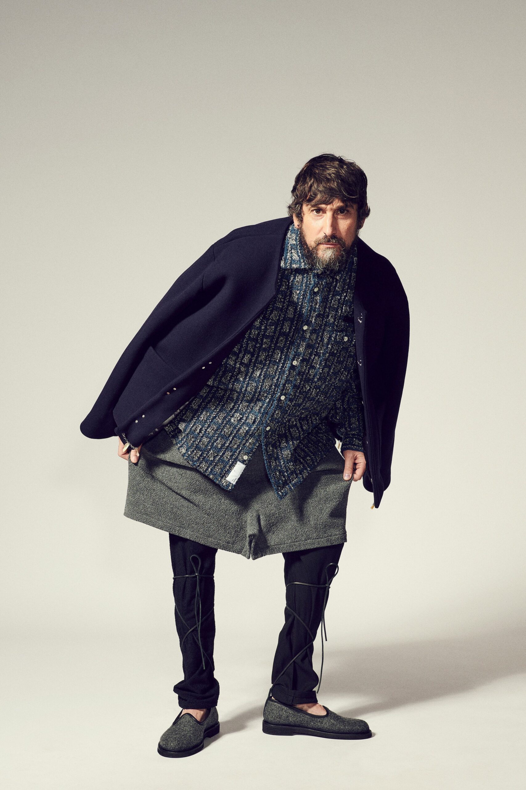 black wool jacket with blue shirt