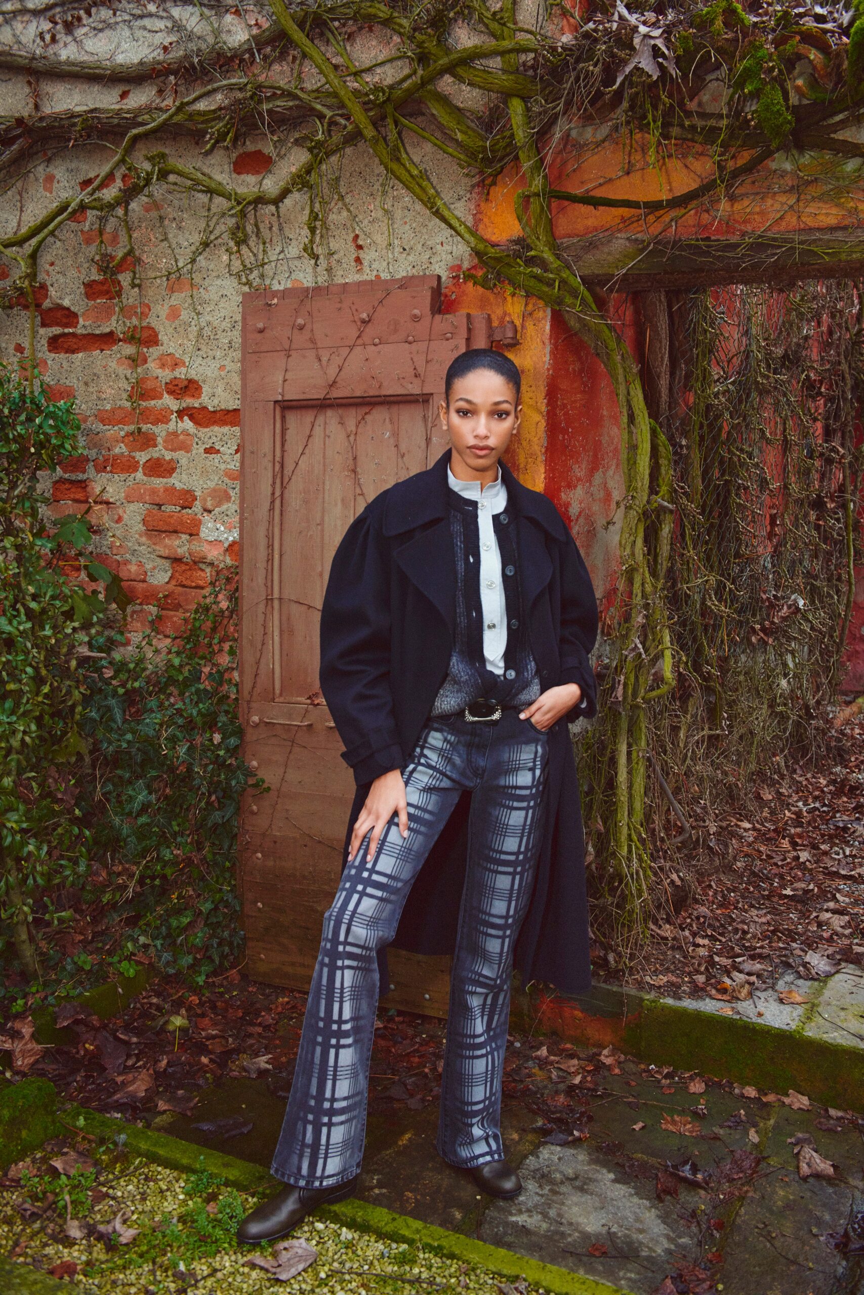 black oversized coat with flared pants