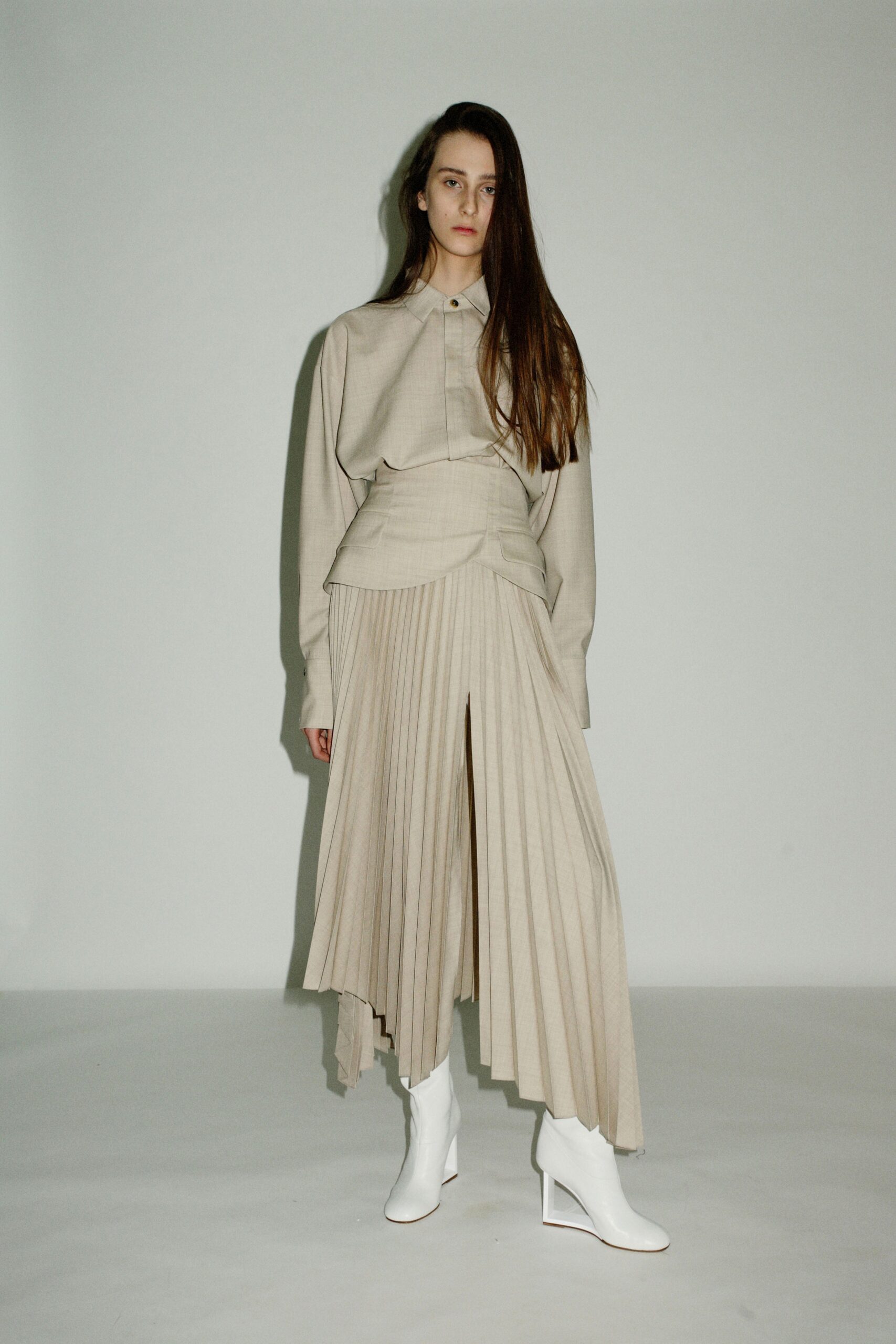 beige cotton long-sleeve collared fitted pleated blouse