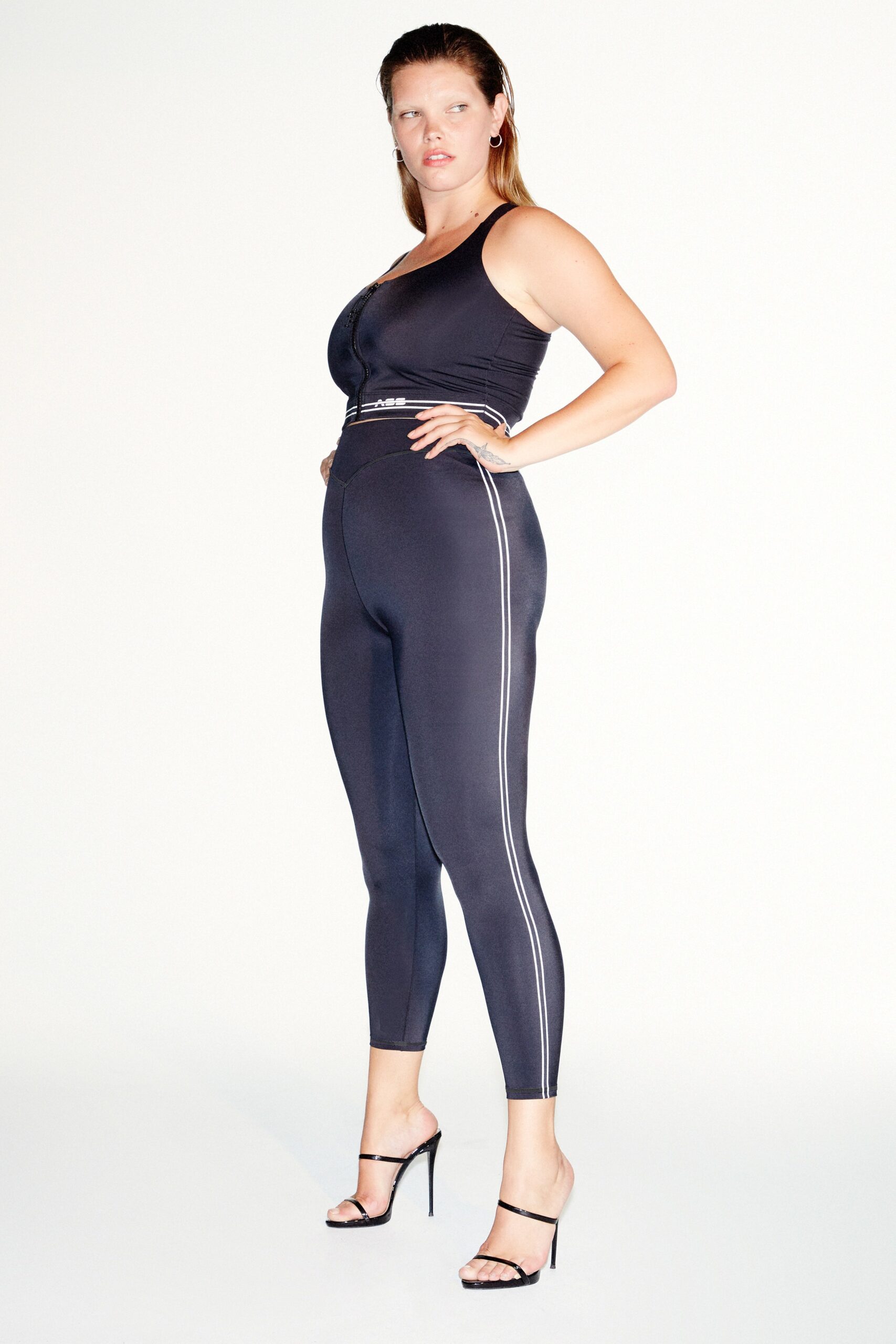 black neoprene tank-top and leggings