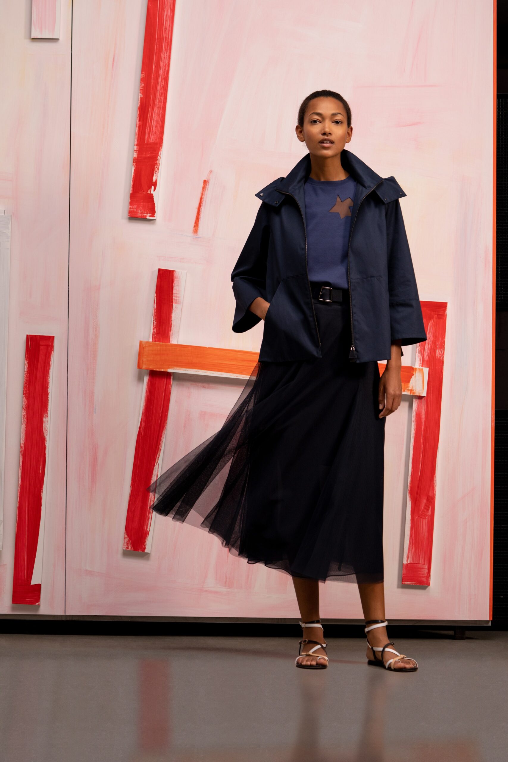 blue relaxed jacket with black skirt