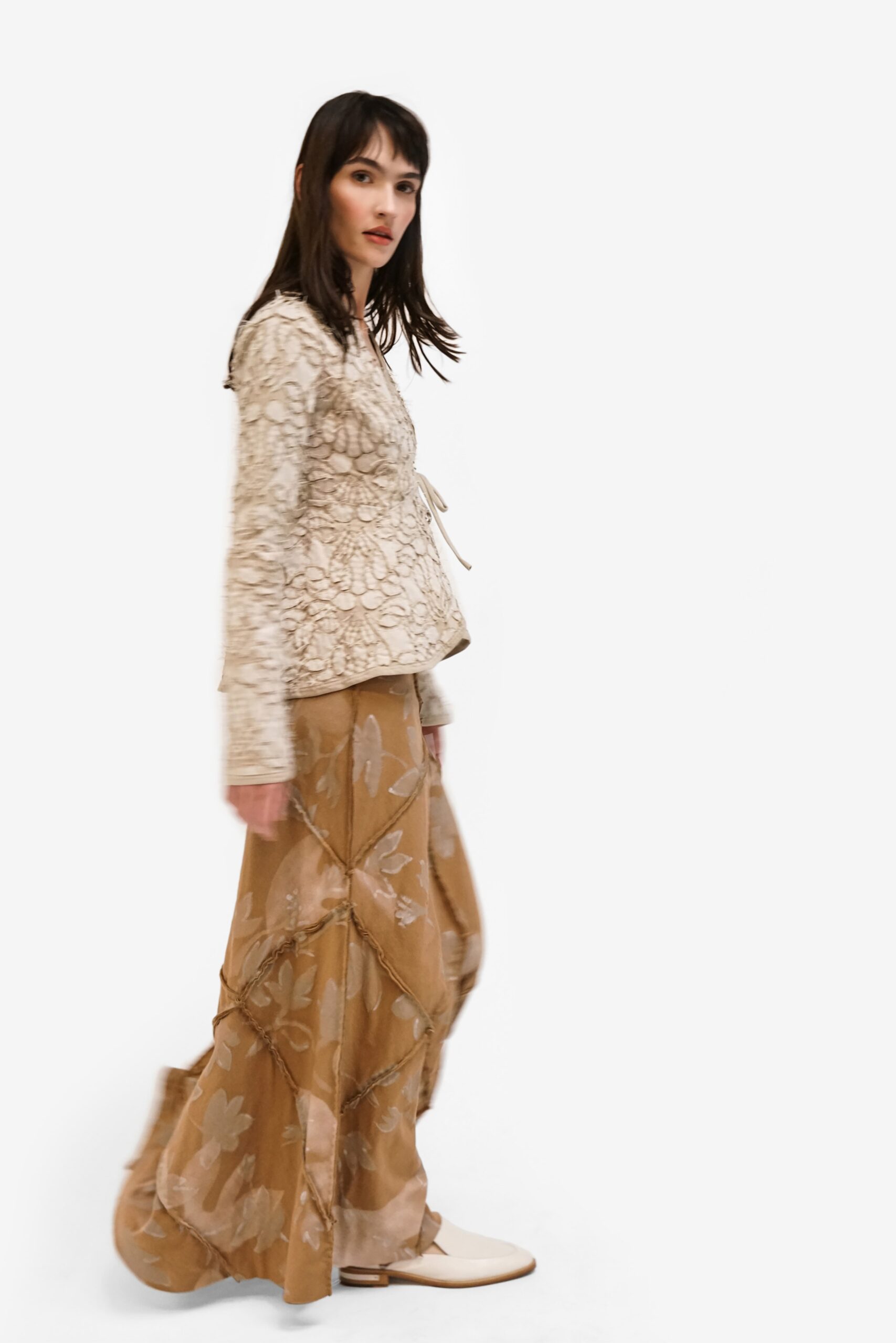 white embroidered top with beige maxi skirt