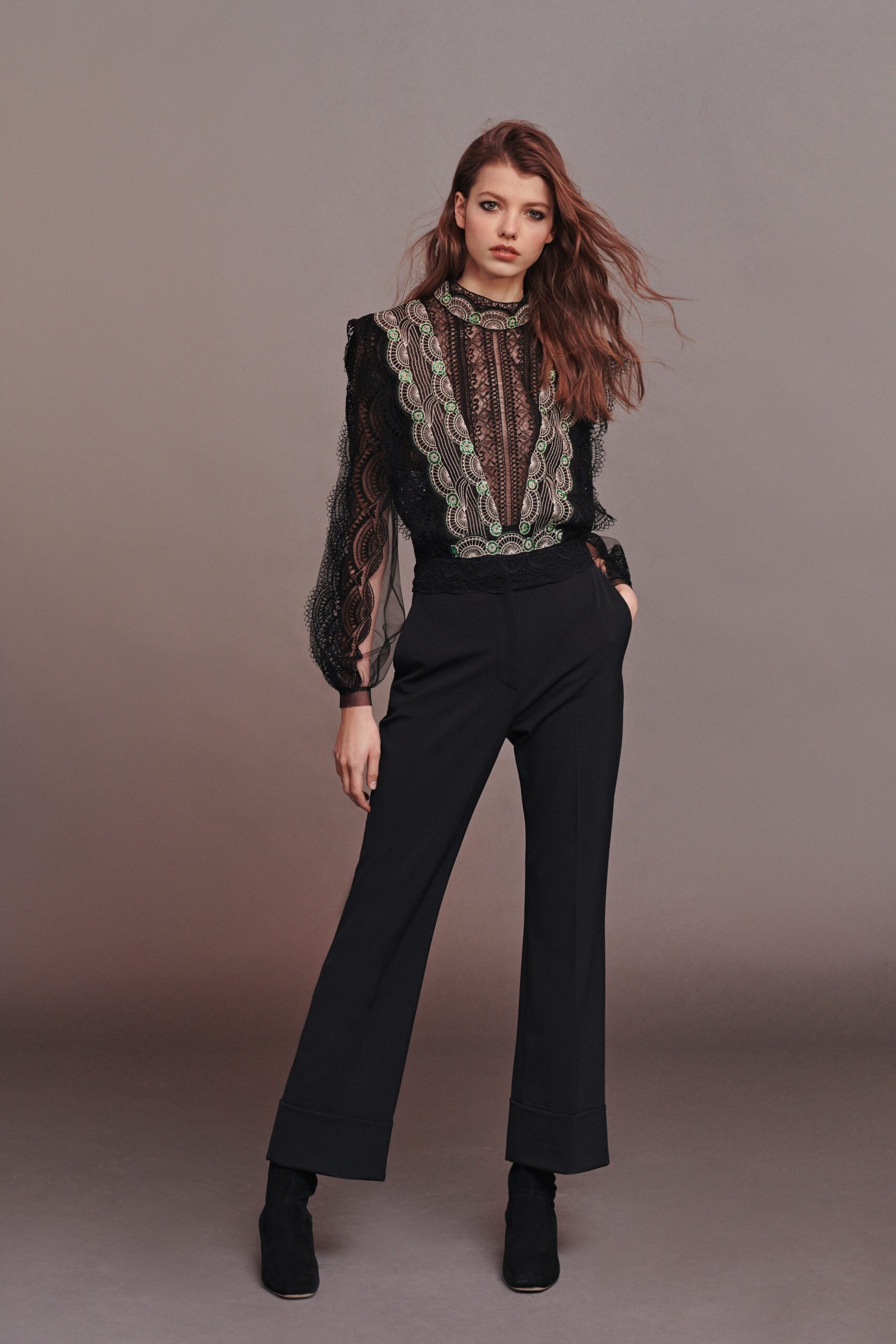black lace blouse with tailored pants