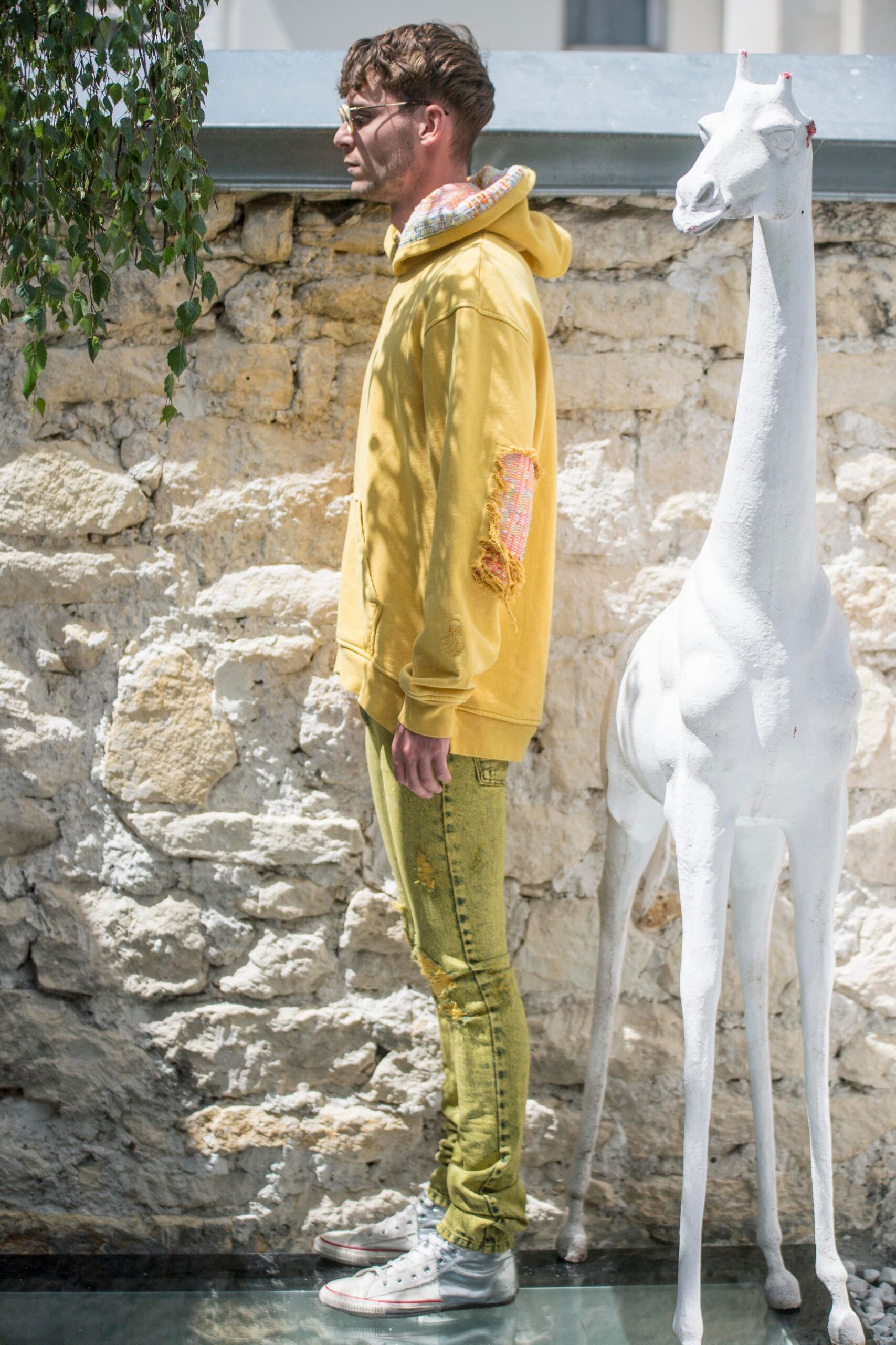 yellow hoodie with green jeans