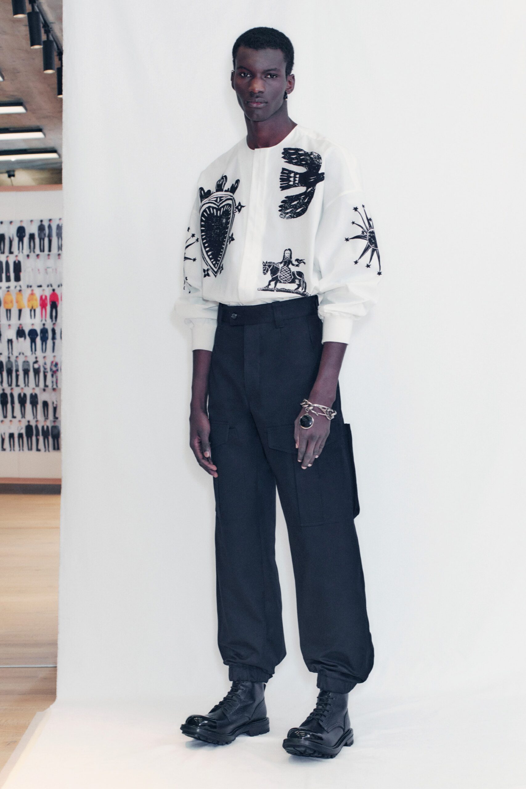 white embroidered shirt black pants