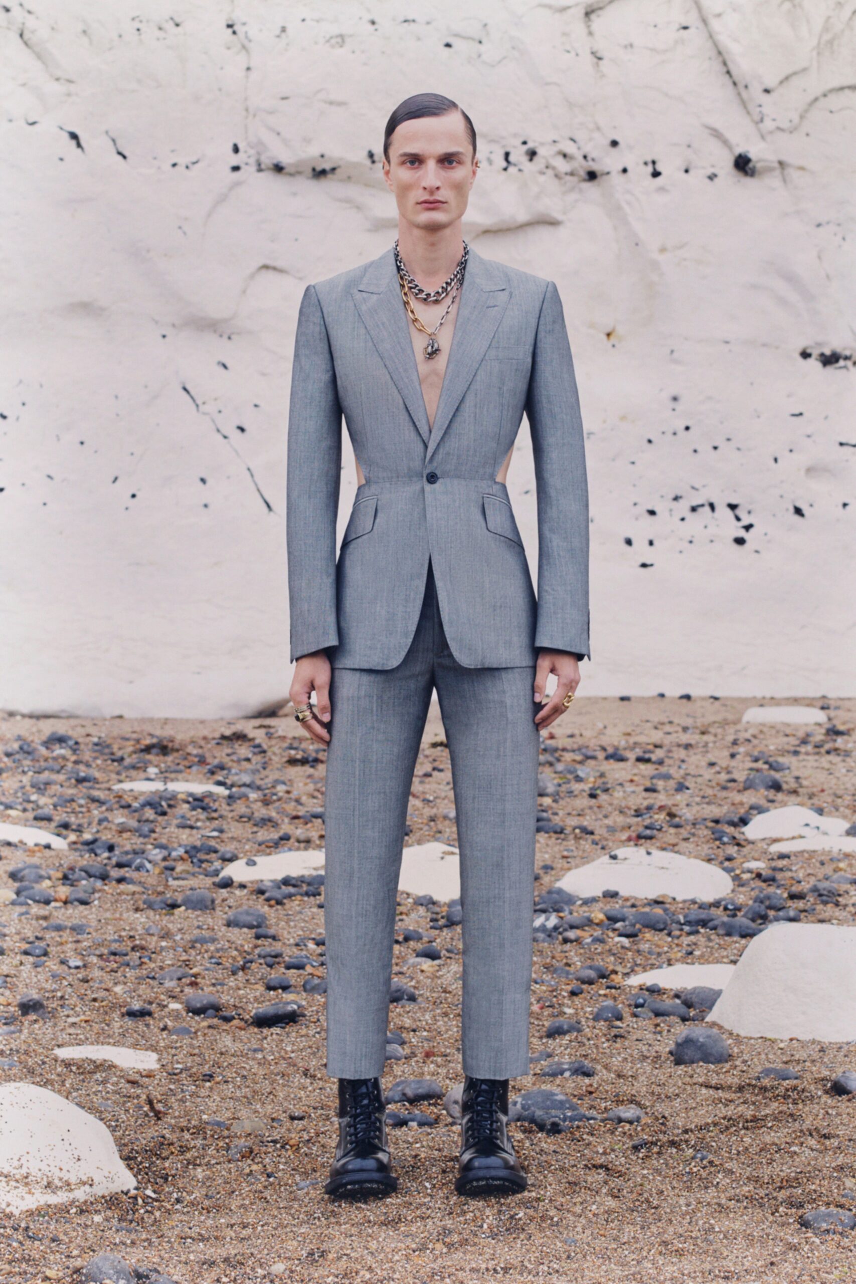 gray tailored suit with beige shirt