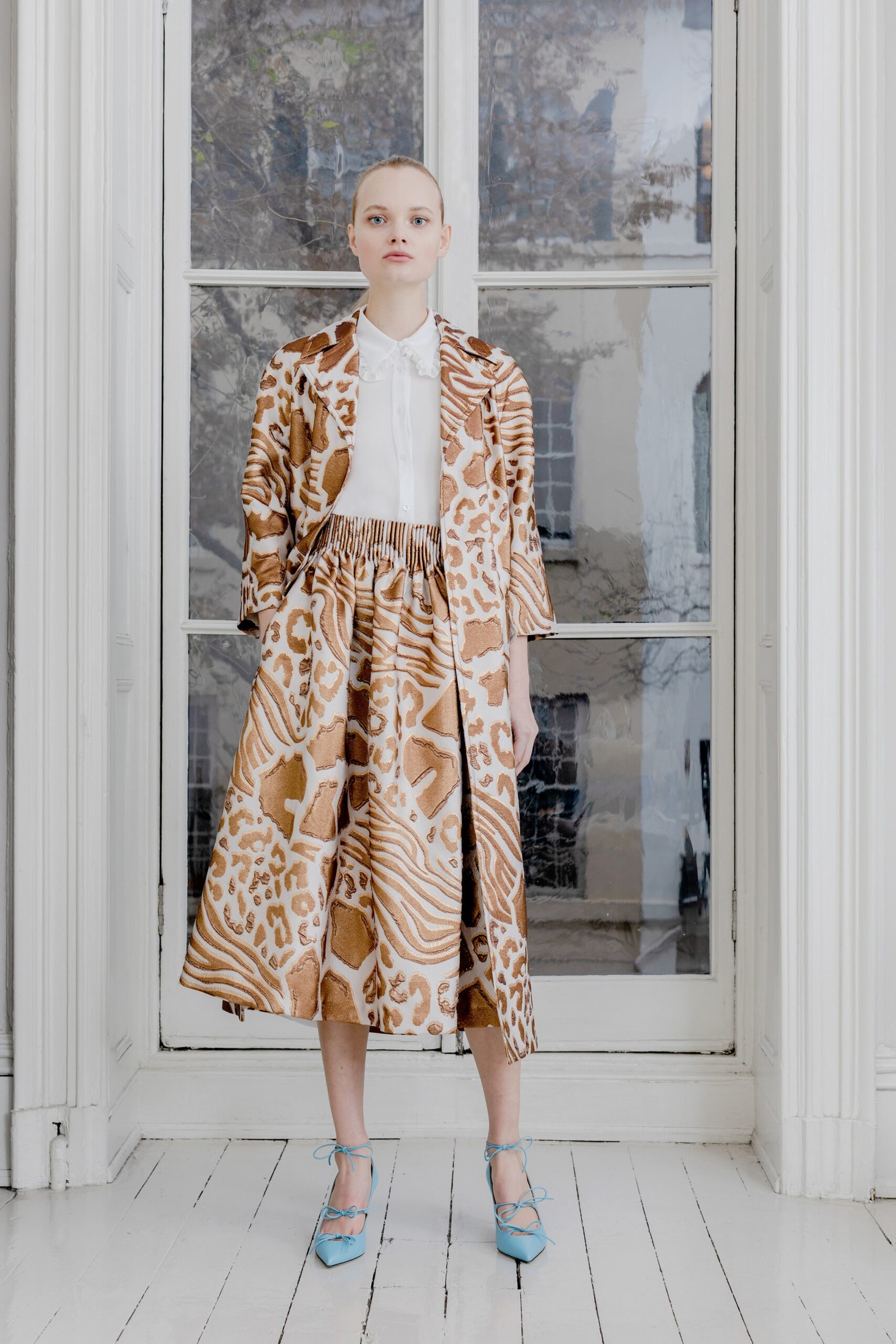 beige silk long-sleeve collared fitted printed coat