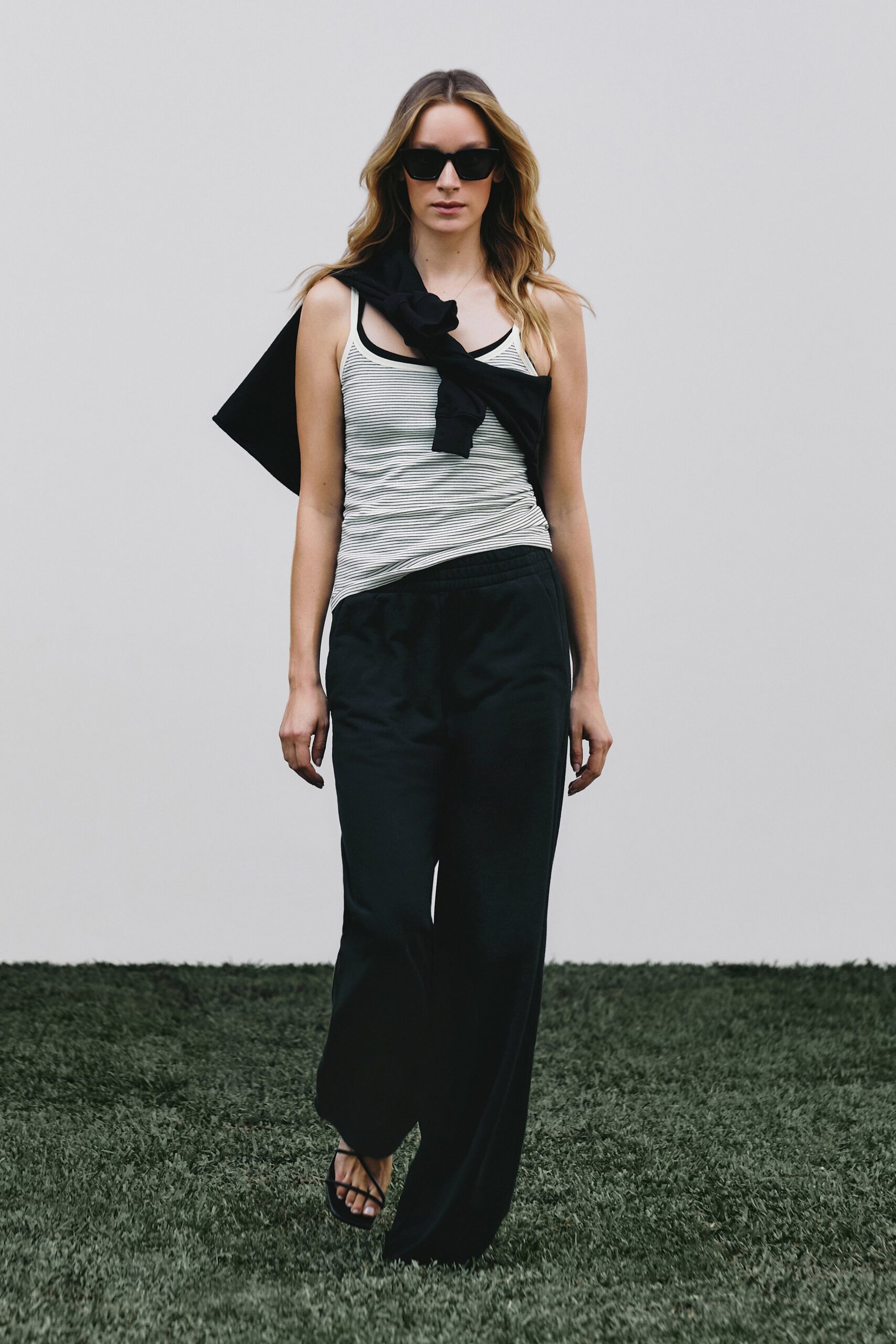 white tank-top black pants outfit
