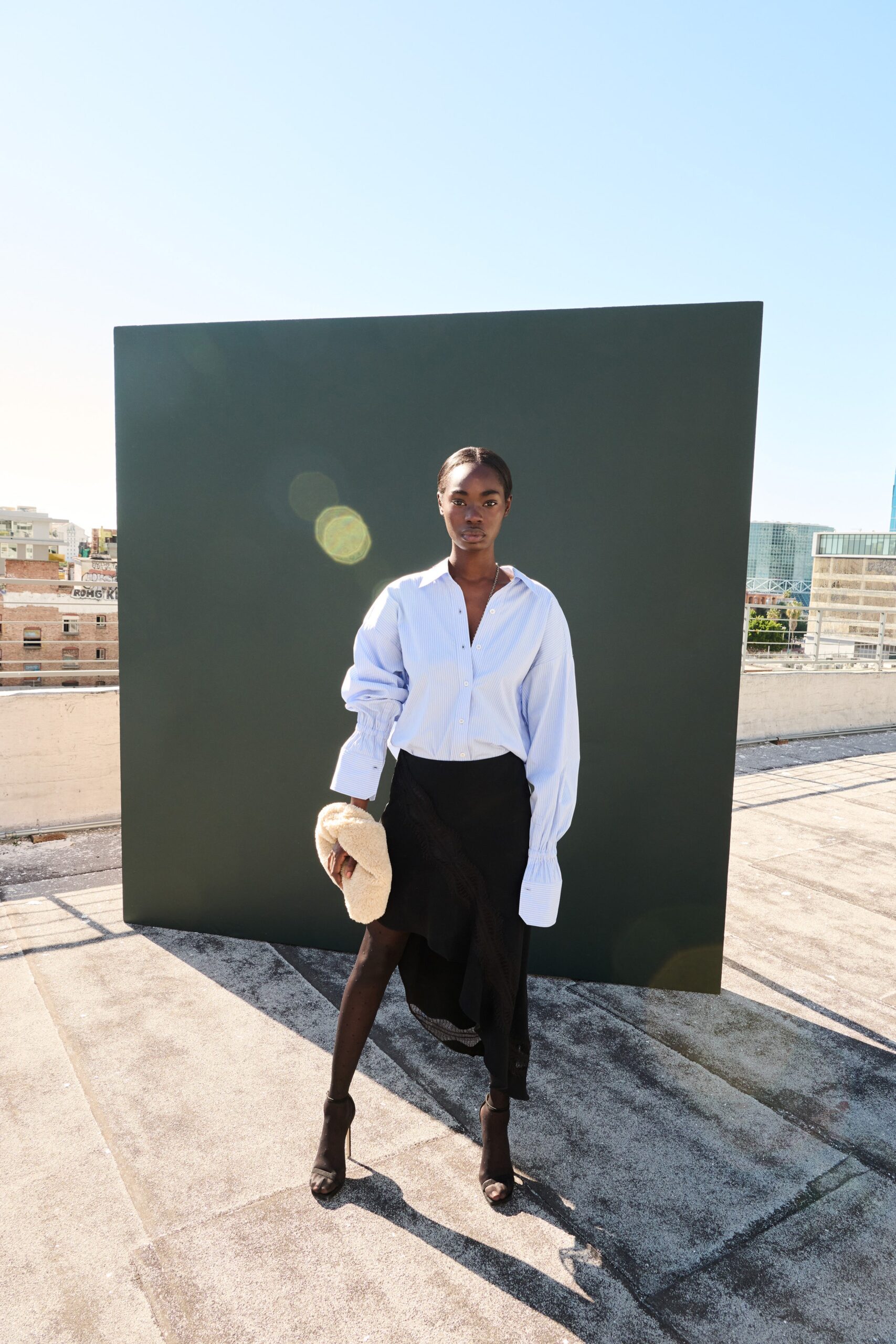 white fitted shirt black asymmetric skirt