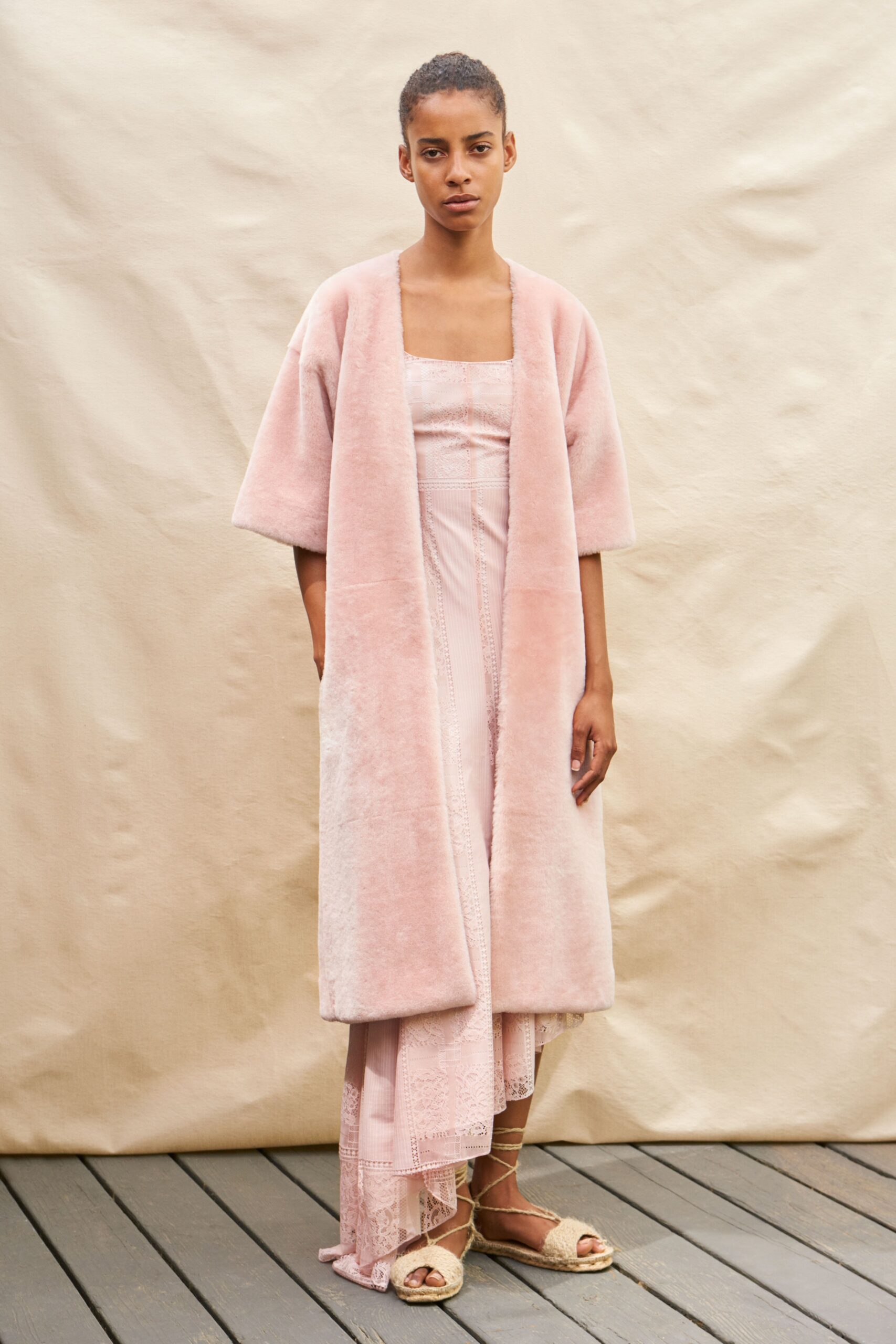 pink silk dress with faux-fur coat