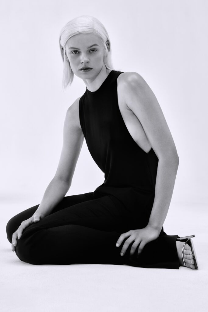 black fitted sleeveless jumpsuit