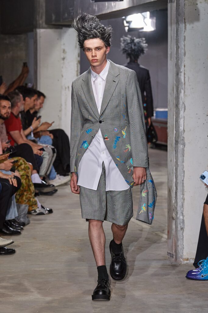 gray tailored suit with shorts