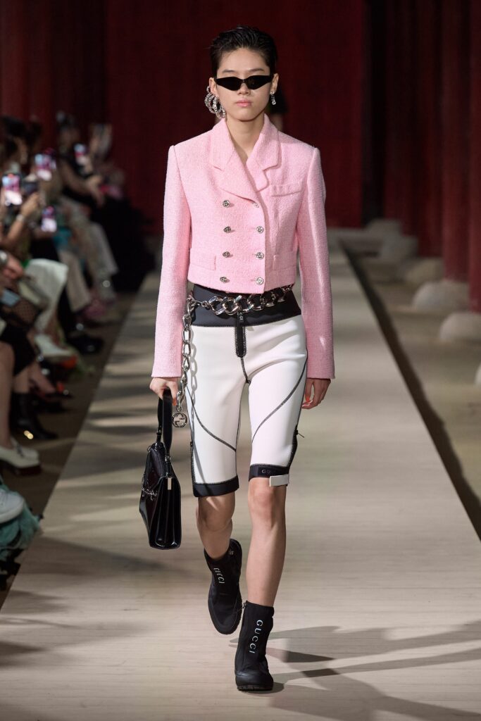pink tweed fitted jacket with white shorts