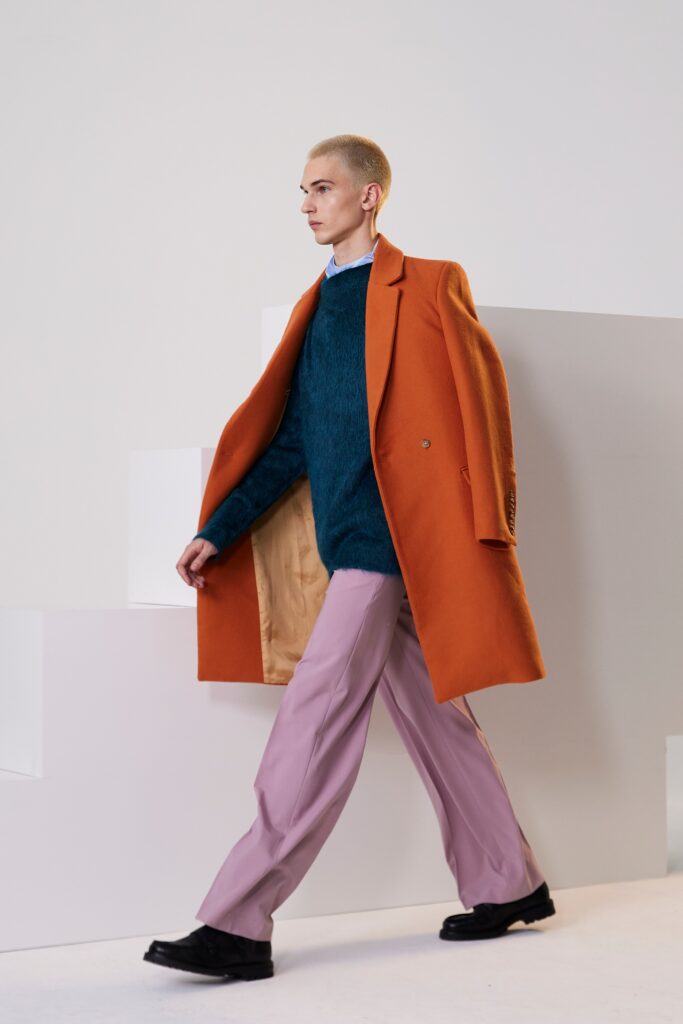 orange coat teal sweater pink pants