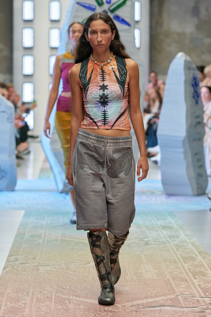 A relaxed gray printed sleeveless top paired with matching shorts for a casual look.