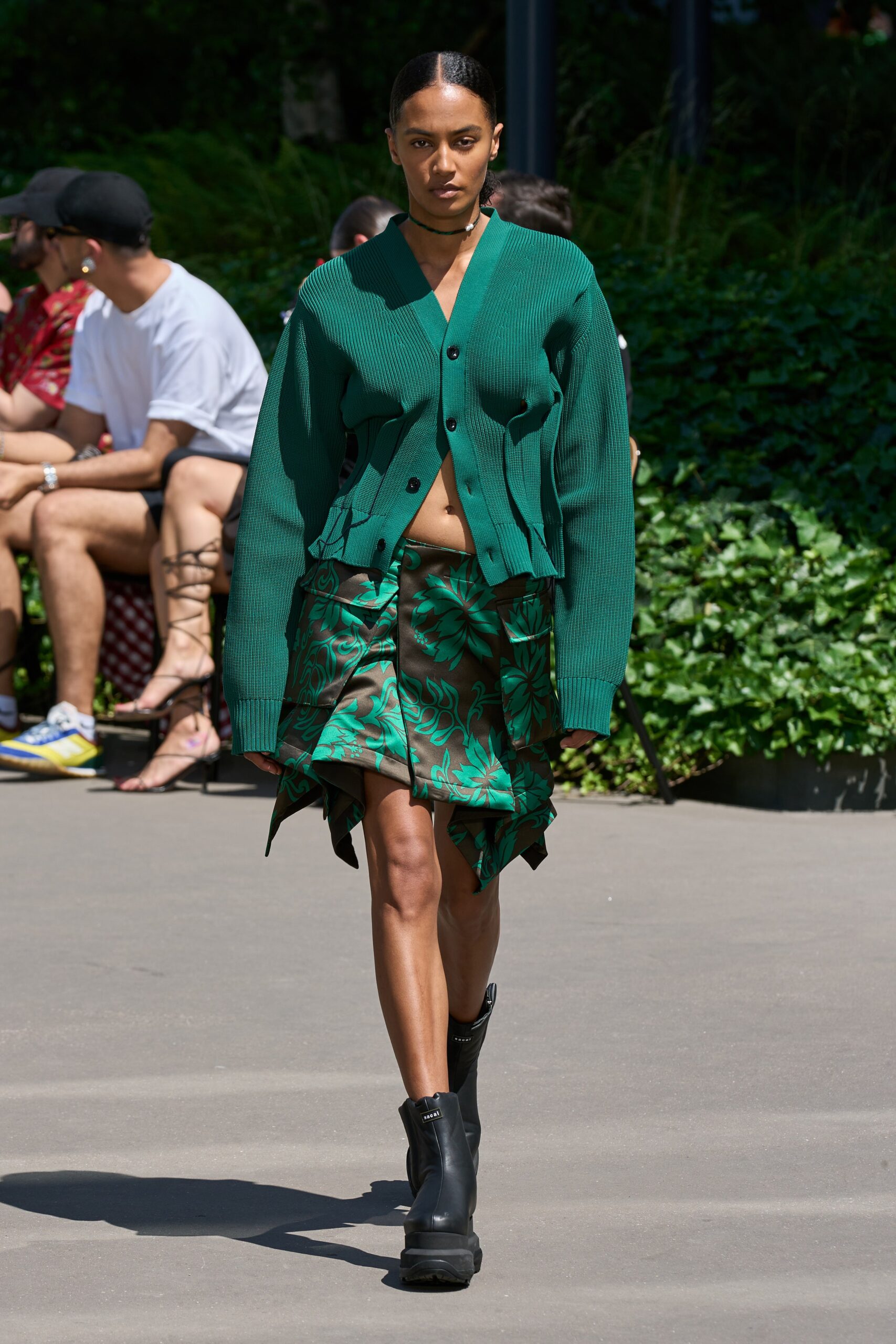 oversized green cardigan and black skirt