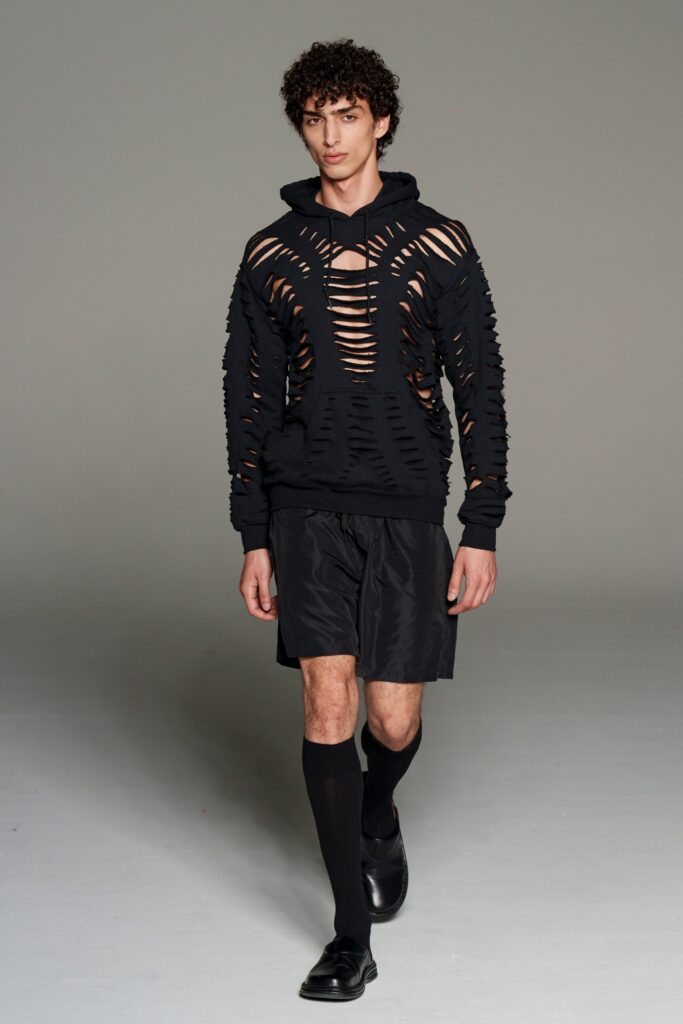 black distressed hoodie and shorts