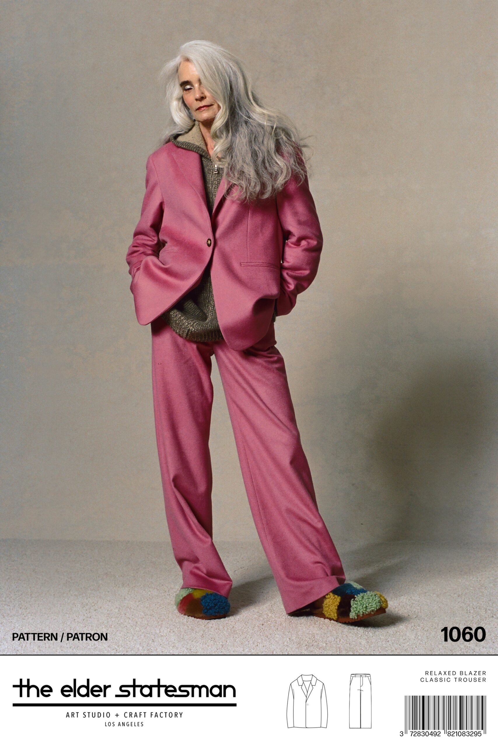 A relaxed pink wool blazer paired with matching trousers featuring a straight-leg design.