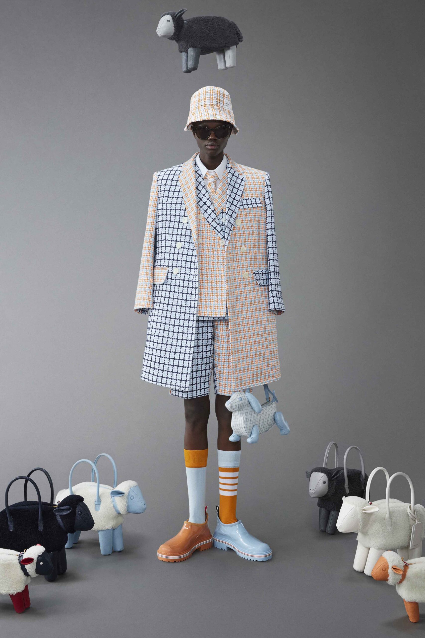 A relaxed blue and orange checked suit with short sleeves and a collared design.